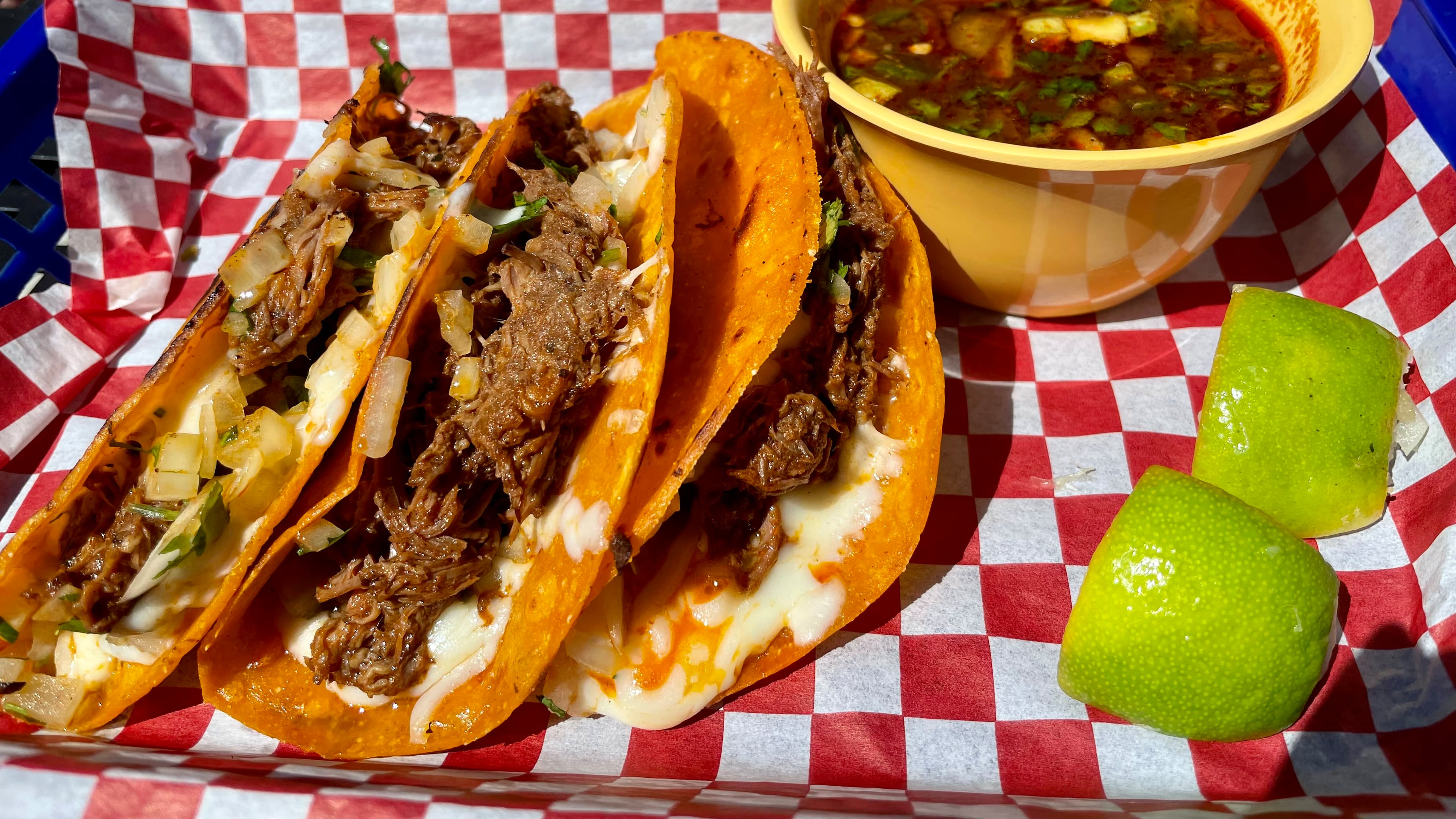 The tacos de birria at Frida’s Taqueria feature brisket-like beef that is fall-apart tender. Angela Hansberger for The Atlanta Journal-Constitution