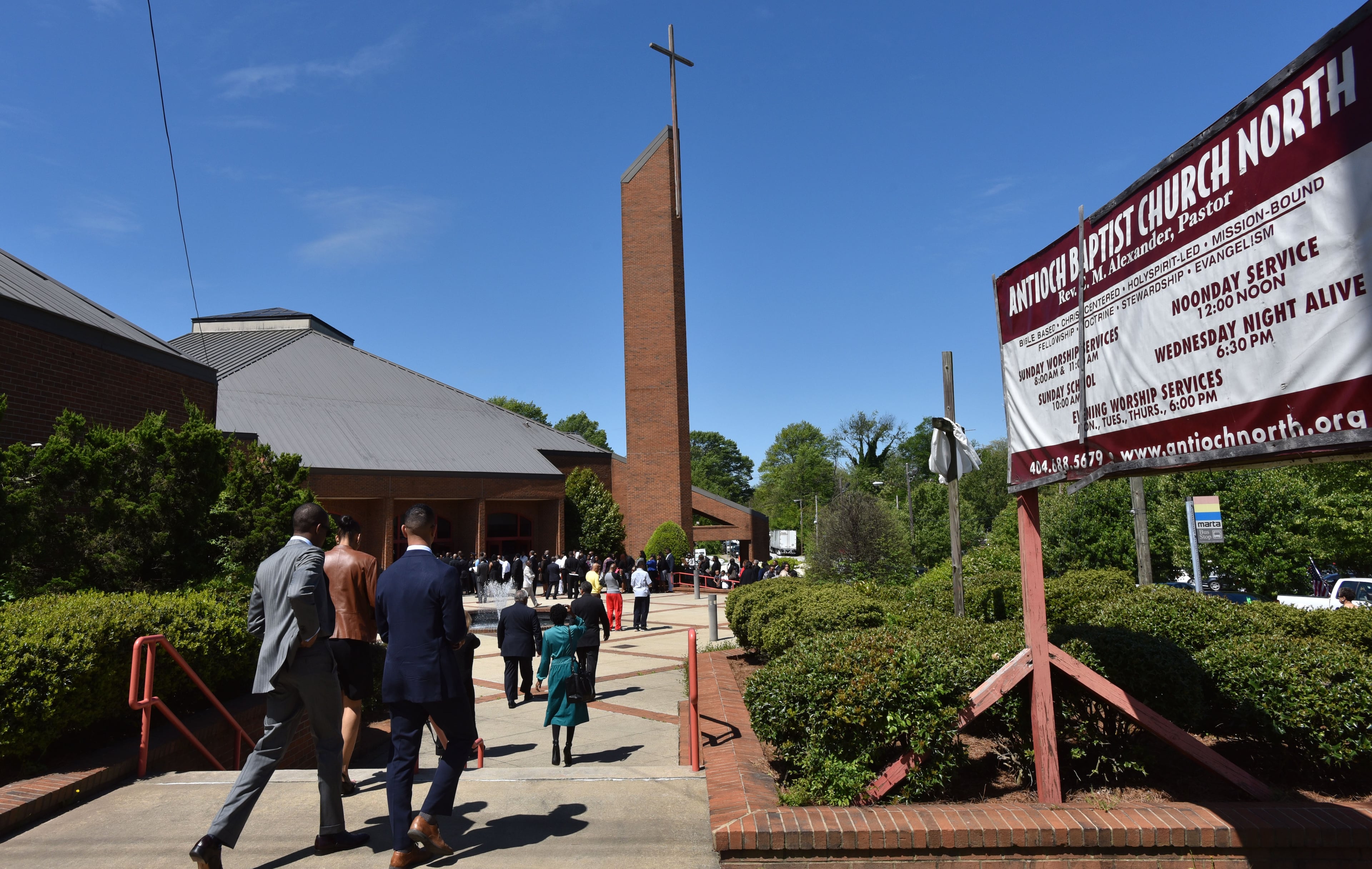 Mourners arrive at Antioch Baptist Church North for the funeral service of community leader Barney Simms on Saturday, April 16, 2016. HYOSUB SHIN / HSHIN@AJC.COM