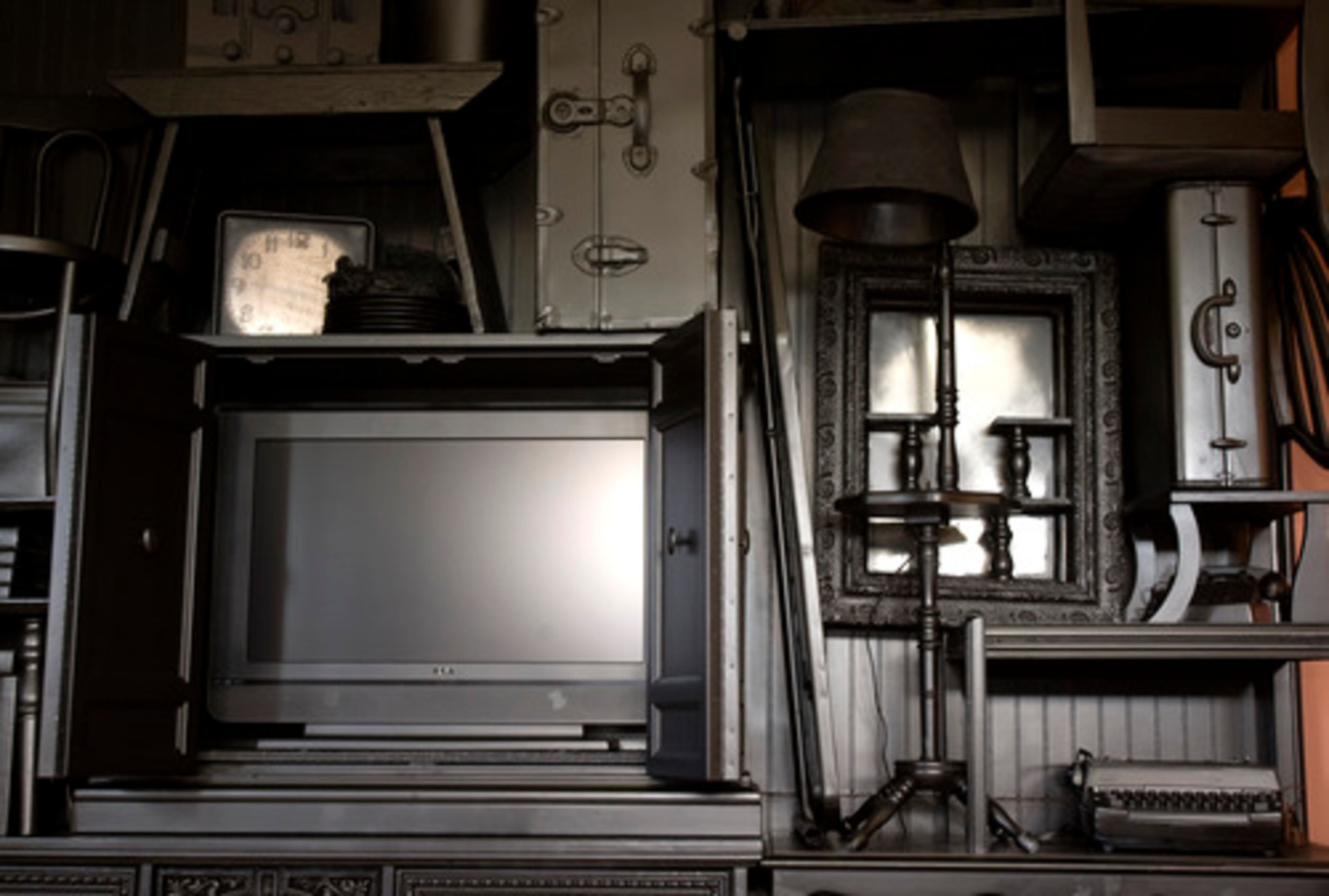 Heritage Hall's bonus room was by LaWayne Johnsen of Inspirations for the Home. It features an entertainment cabinet created out of old items, like suitcases and an old typewriter.