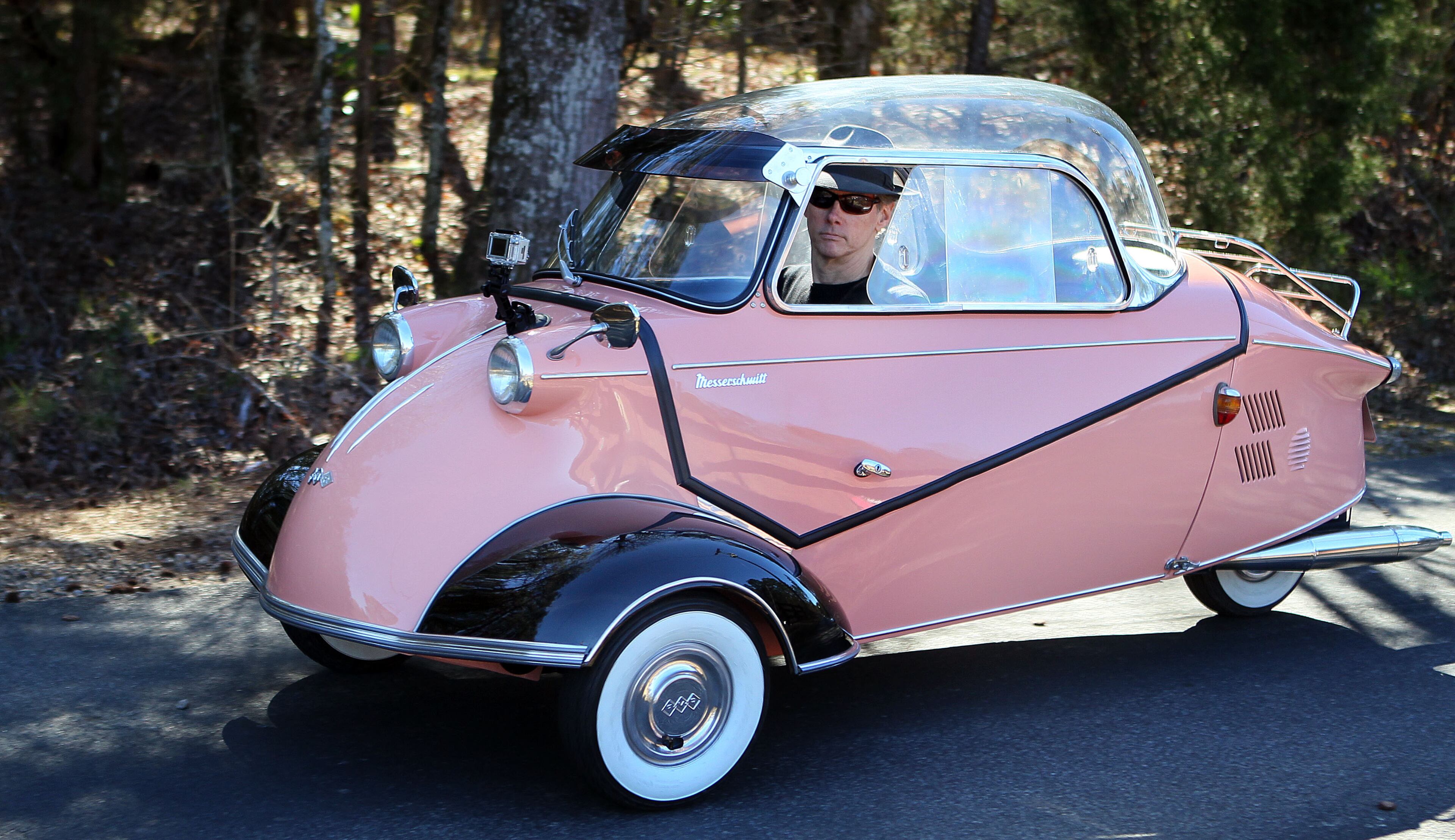Reporter Mark Davis takes the wheel of a 1958 Messerschmitt. Nearly all of microcar collector Bruce Weiner’s cars were shipped here from European nations. Now, Weiner prepares to auction off most of his collection.