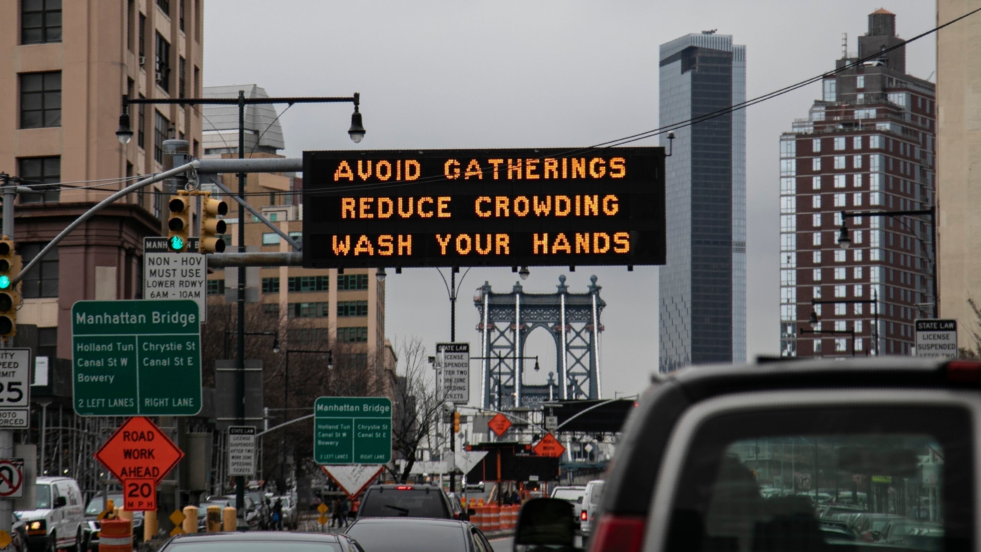In this March 19, photo, a flashing sign urges New Yorkers to avoid gatherings, reduce crowding and to wash hands. A South Georgia teacher fears that message has not yet been taken seriously in her community, and that puts her husband at risk due to pre-existing health conditions.