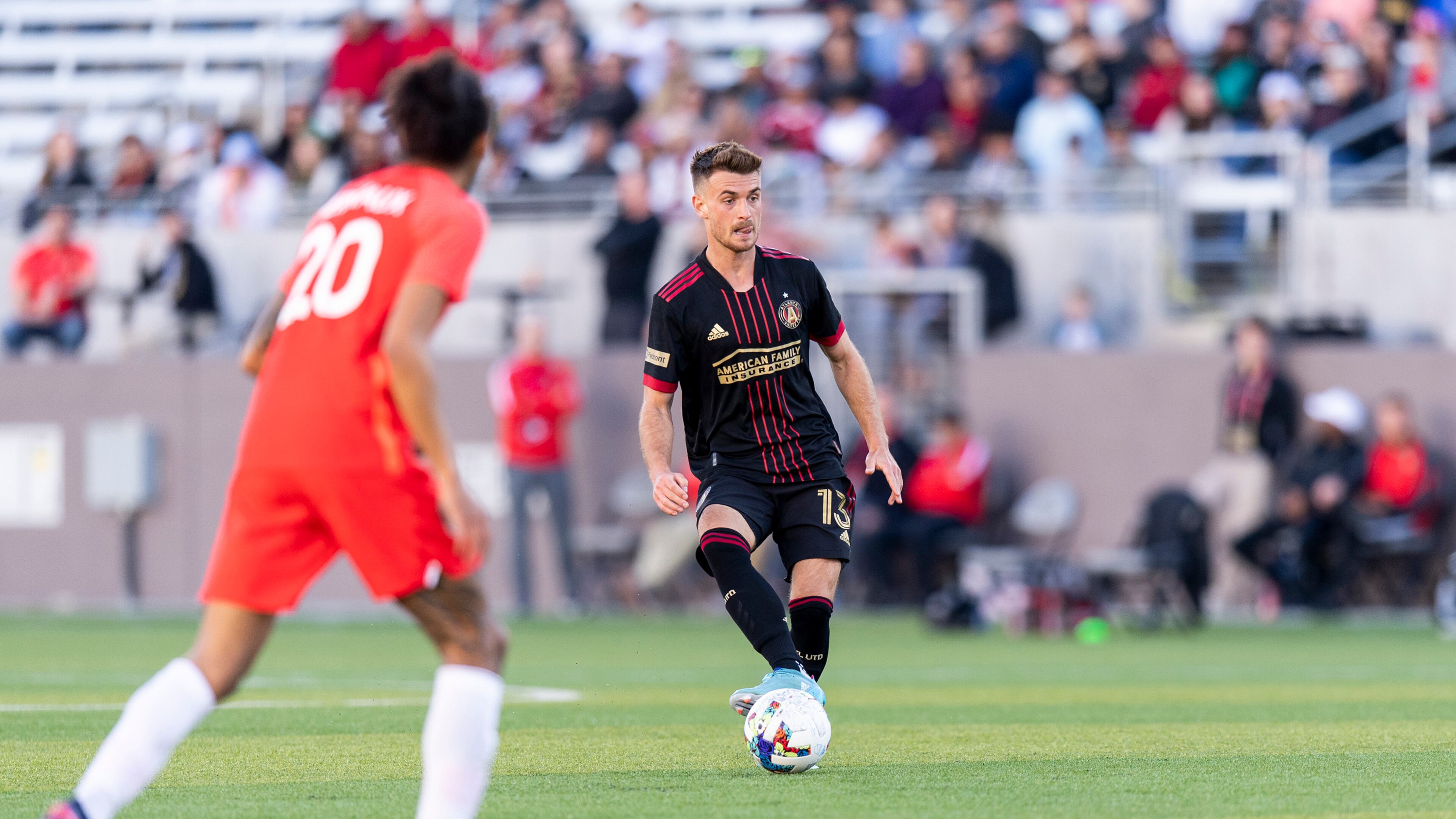 Atlanta United midfielder Amar Sejdic #13 dribbles the ball during the 2022 preseason match against Birmingham Legion at Protective Stadium in Birmingham, United States on Sunday February 20, 2022. (Photo by Jacob Gonzalez/Atlanta United)