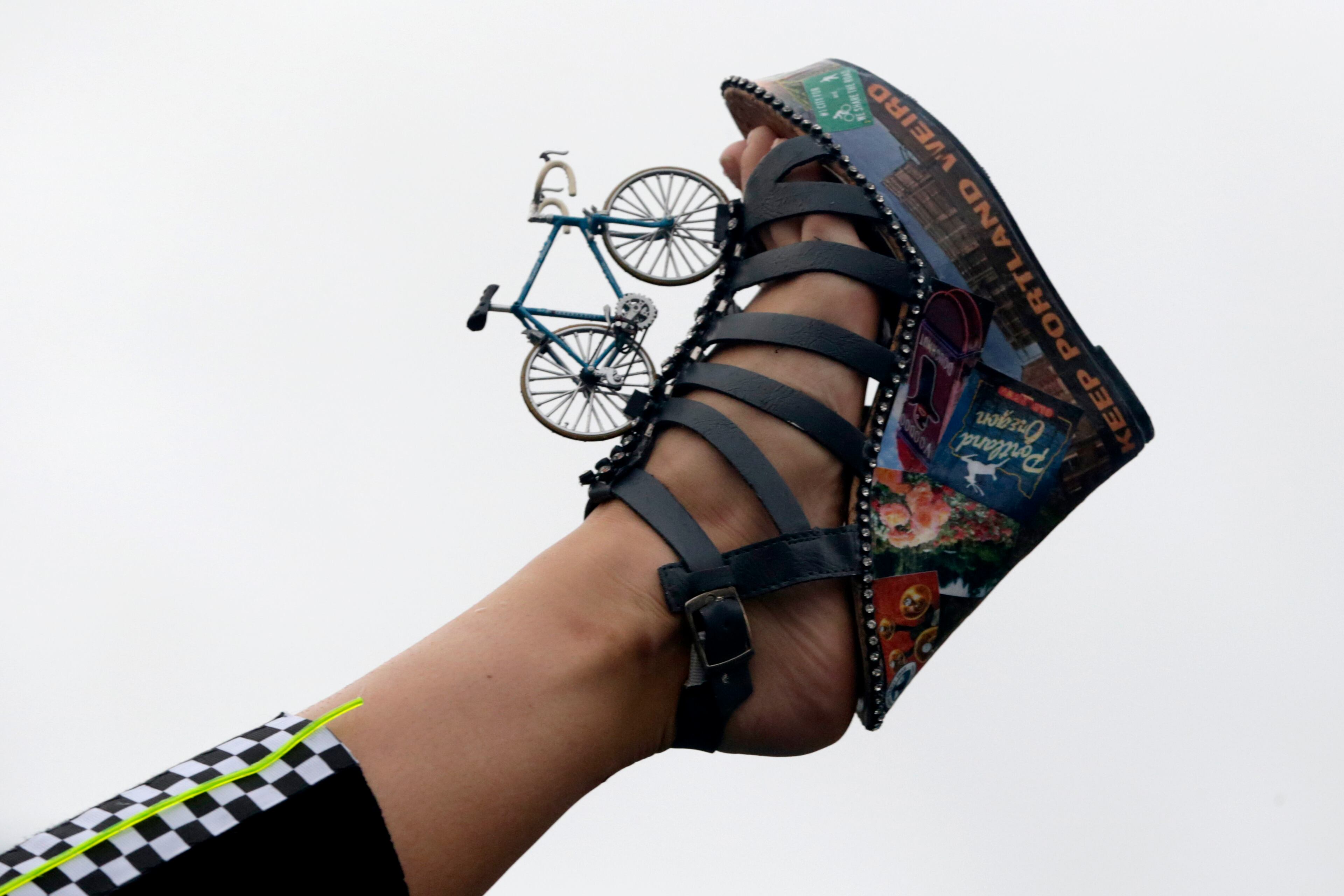 Miss Oregon Rebecca Anderson displays her shoe during the Miss America Shoe Parade at the Atlantic City boardwalk, Saturday, Sept. 13, 2014, in Atlantic City, N.J. (AP Photo/Julio Cortez)
