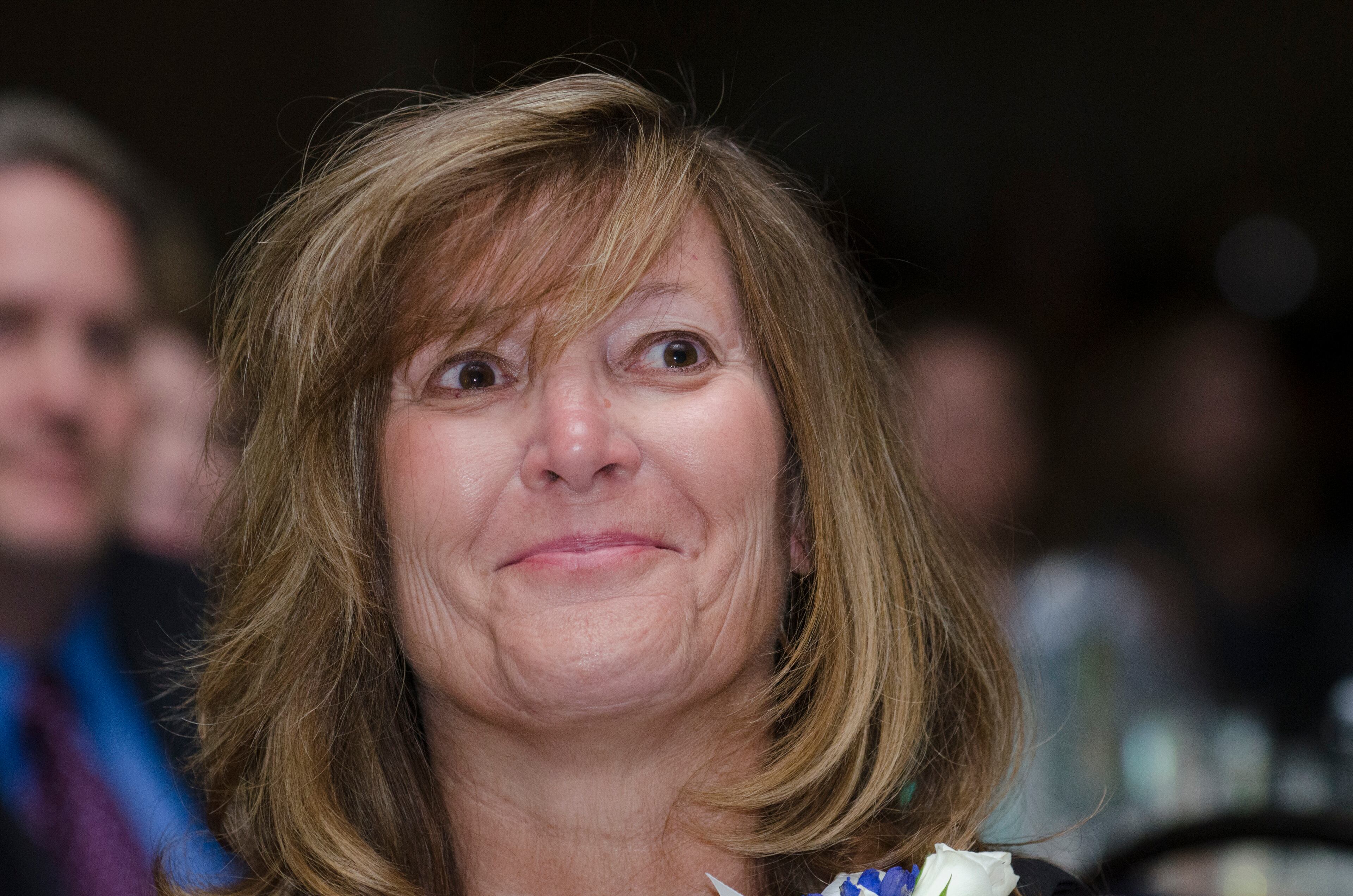 Sherry King winner of Celebrating Nurses AJC Jobs Nursing Excellence Awards watches her video documentary the awards luncheon Tuesday, May 6, 2014 at the Cobb Galleria. (Photo by Barry Williams/Special)
