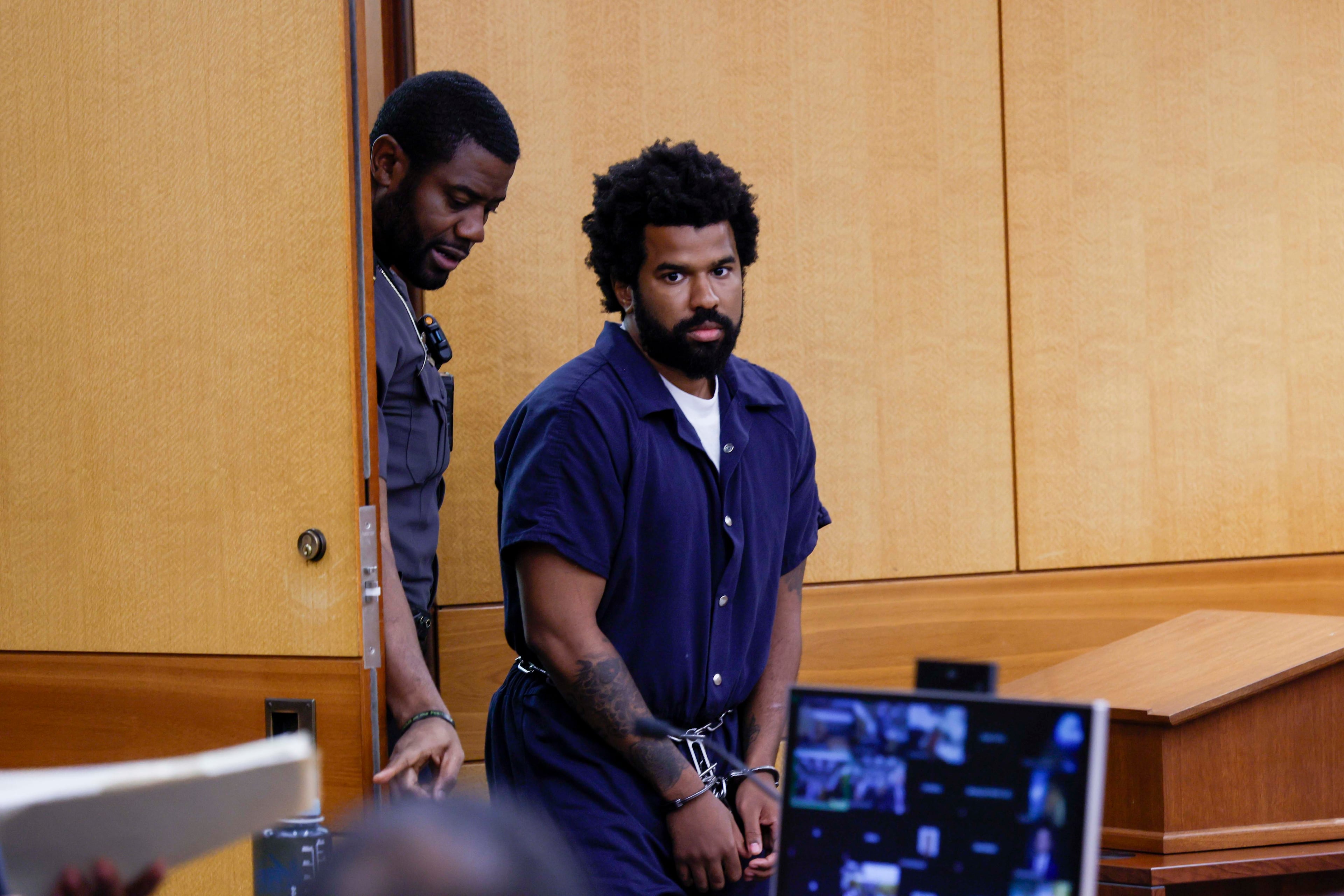 Deion Duwane Patterson enters Judge Eric Dunaway's courtroom at Fulton County Superior Court on Thursday, April 16.
(Miguel Martinez/AJC)