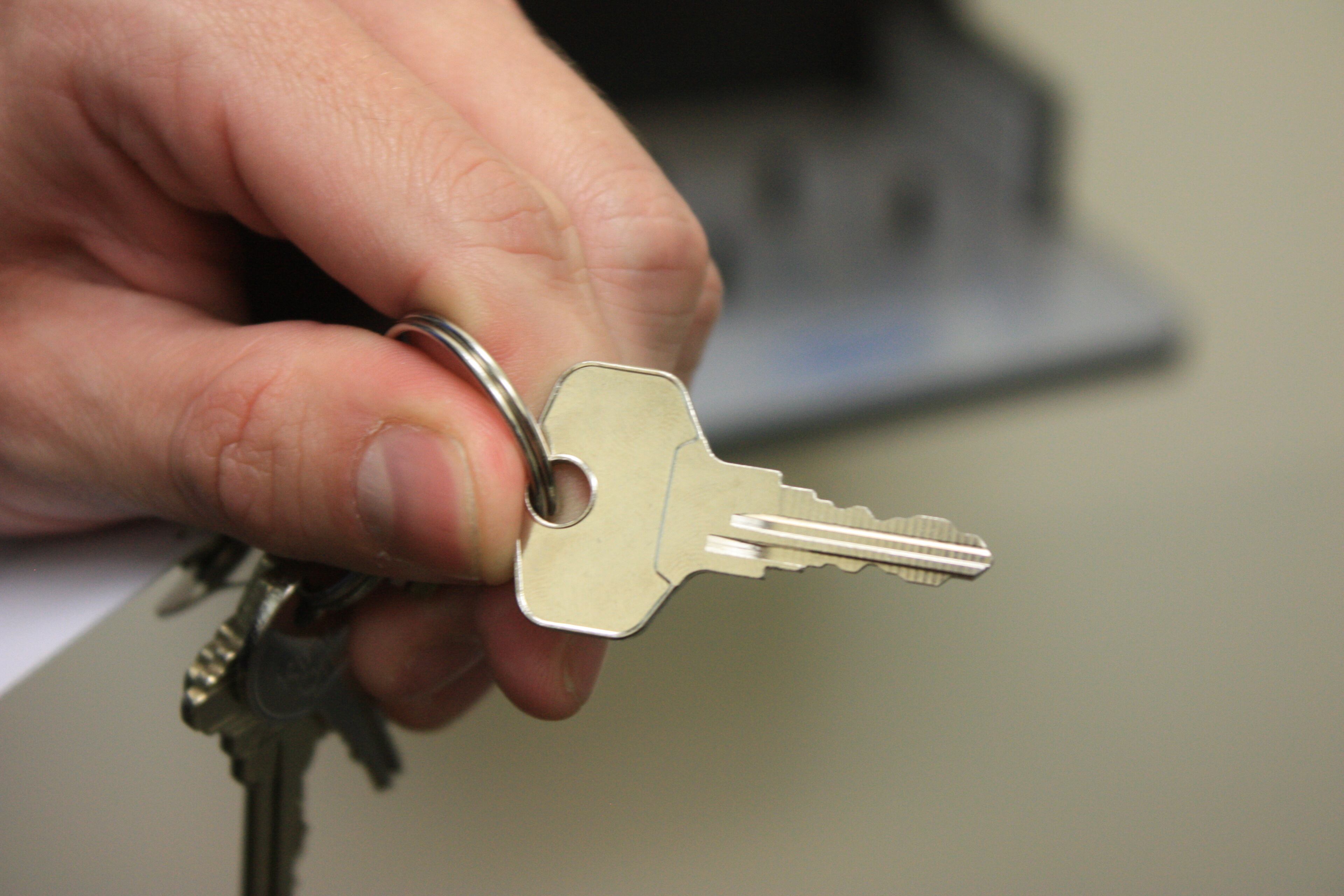 Finally, the customer uses a key to open his or her box....