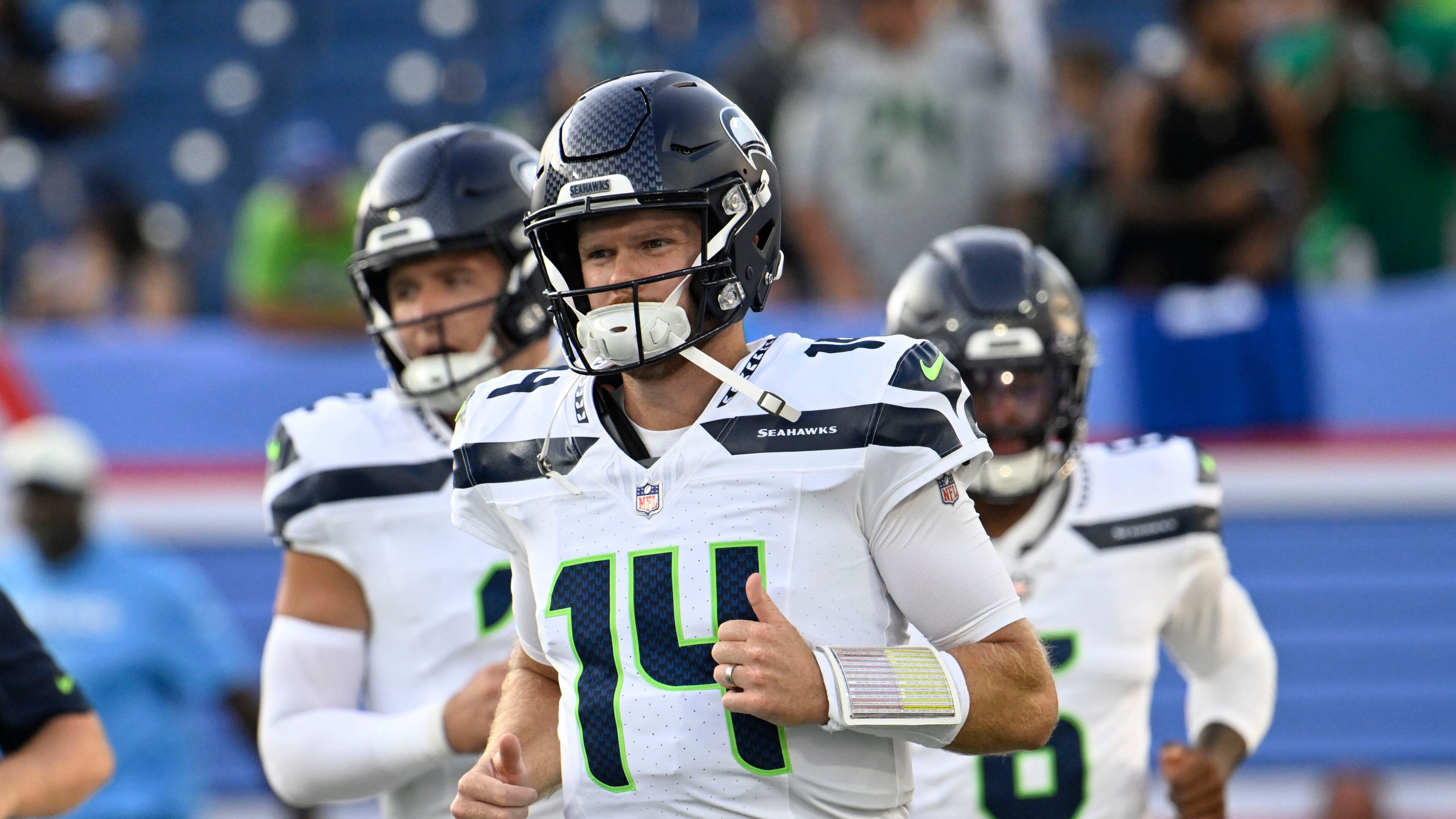 Seattle Seahawks quarterback Sam Darnold (14) warms up before a preseason NFL football game against the Tennessee Titans, Sunday, Aug. 23, 2026, in Nashville, Tenn. (AP Photo/John Amis)