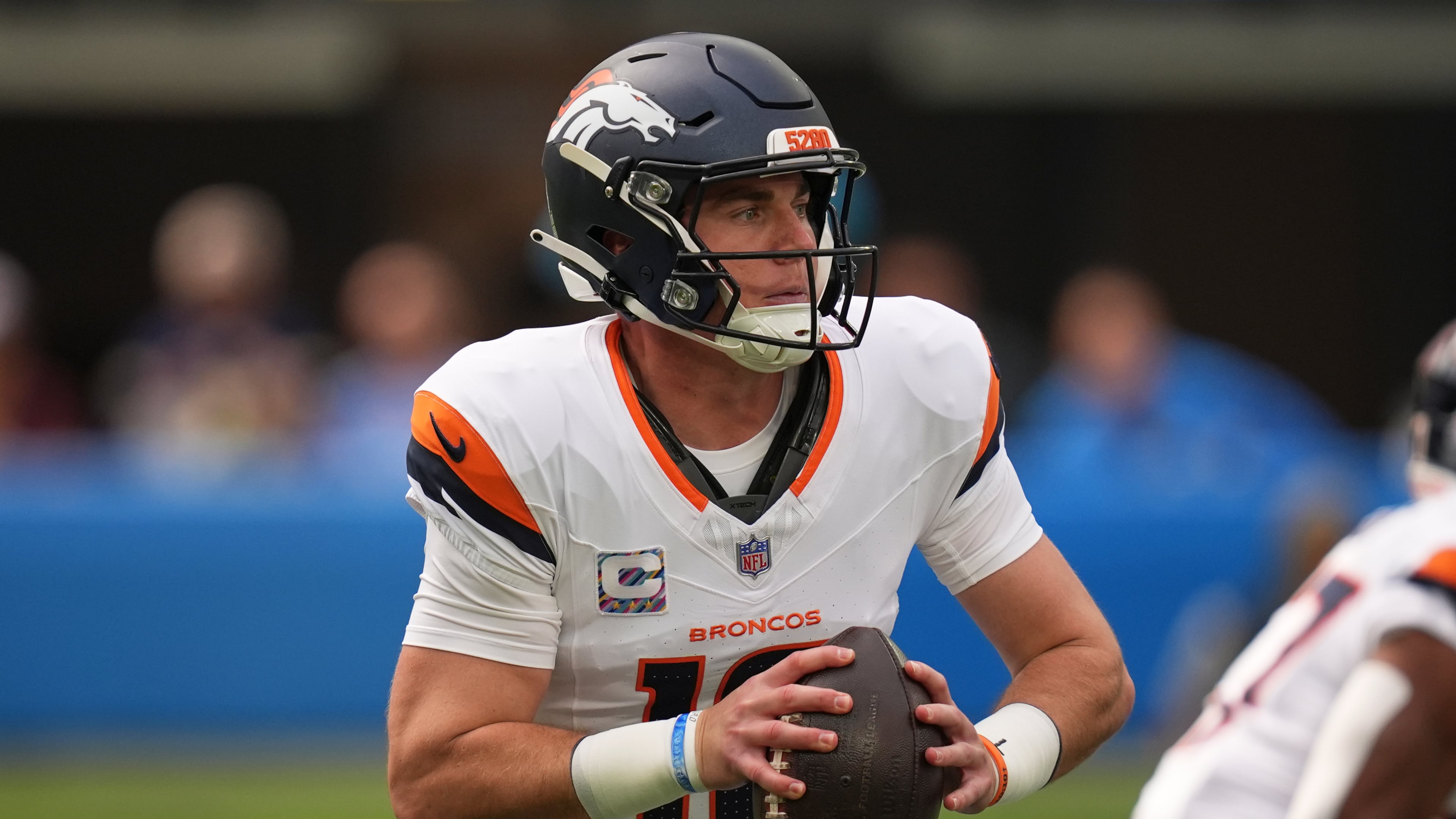 Denver Broncos quarterback Bo Nix gets set to pass during the first half of an NFL football game against the Los Angeles Chargers, Sunday, Oct. 11, 2026, in Inglewood, Calif. (AP Photo/Gregory Bull)