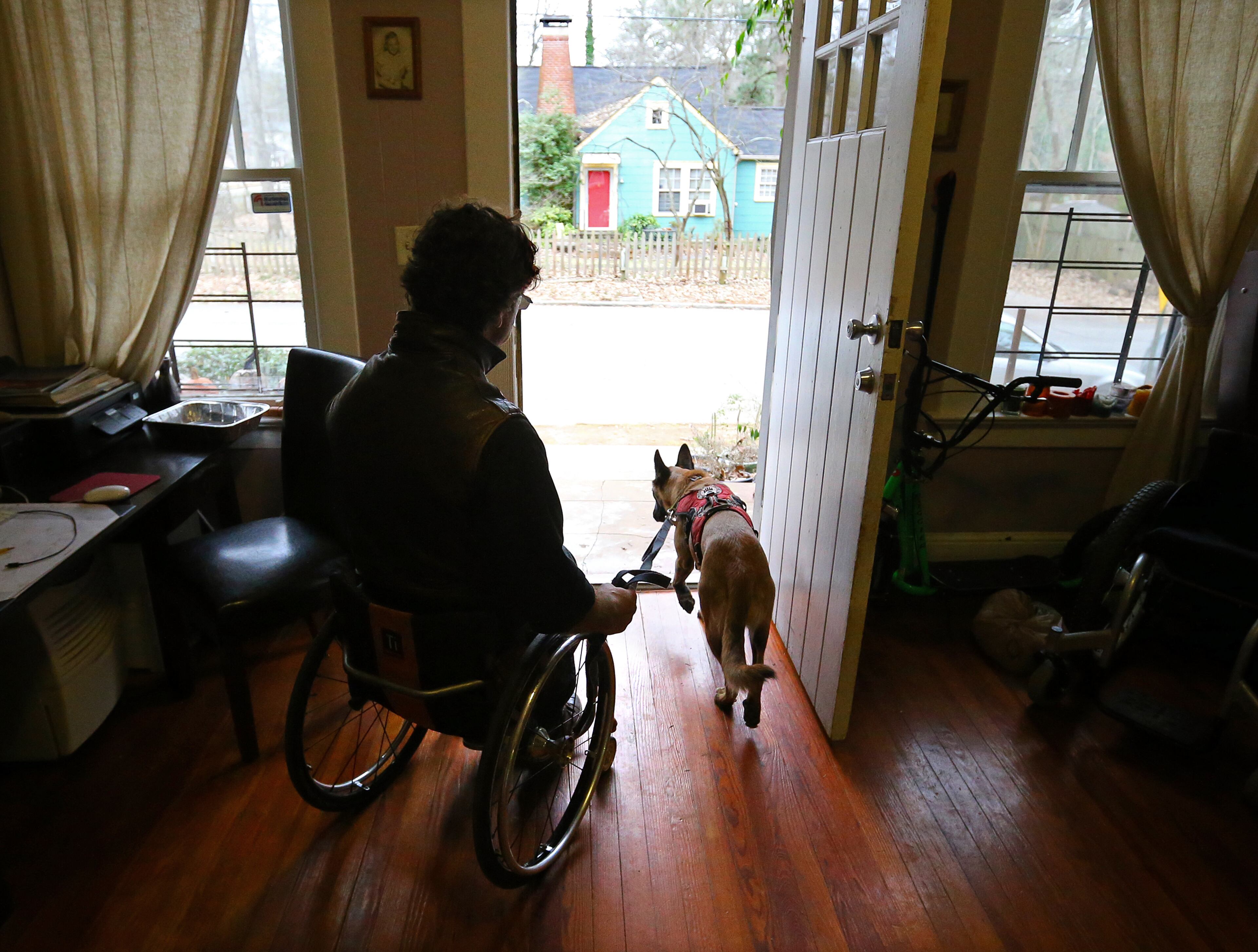 Pete Anziano leaves his home for some afternoon training with his dog Amelie on Thursday, Jan. 9, 2014, in Decatur. Click here to read more about Anziano, his dogs and his sport.