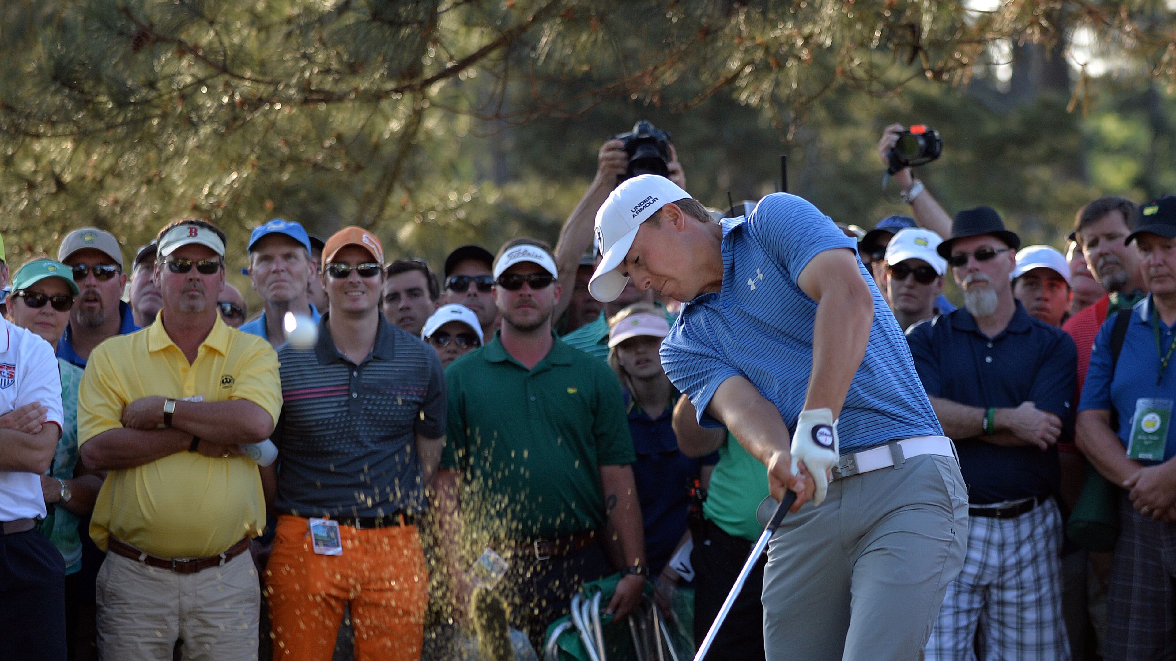 APRIL 11, 2015 AUGUSTA Jordan Spieth hits from the rough on #17. Photos from the third round at the Masters Golf Tournament, Saturday, April 11, 2015. BRANT SANDERLIN/BSANDERLIN@AJC.COM Jordan Spieth hits out of rough on 17th hole, when a double bogey dropped him to 16-under. (Brant Sanderlin, AJC)