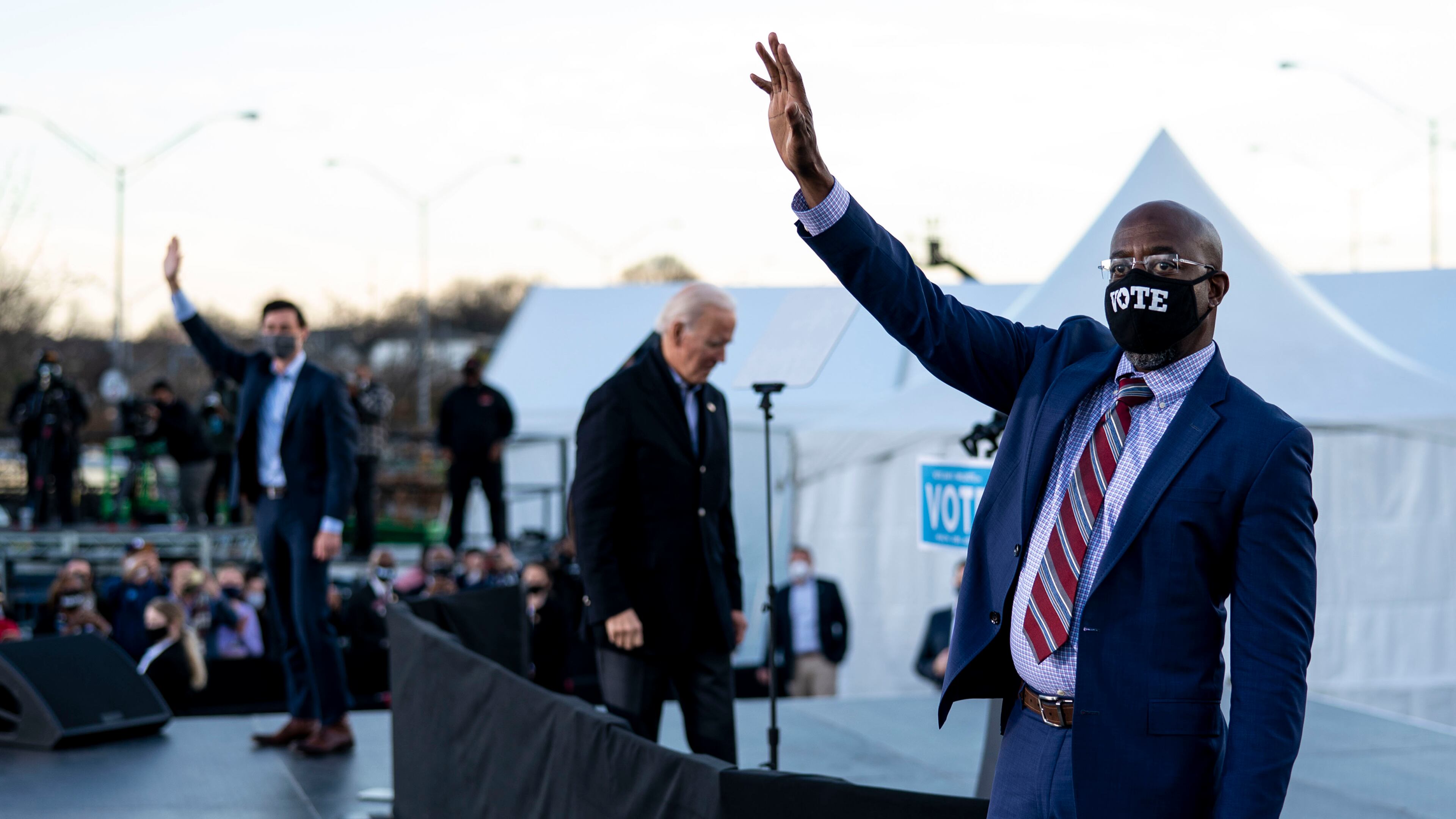 President-elect Joe Biden, center, while campaigning for Democratic Senate candidates Jon Ossoff, left, and the Rev. Raphael Warnock, right, in Atlanta on Monday, Jan. 4, 2021. After both won Senate seats, Biden told supporters he was “more optimistic than ever.” (Doug Mills/The New York Times)