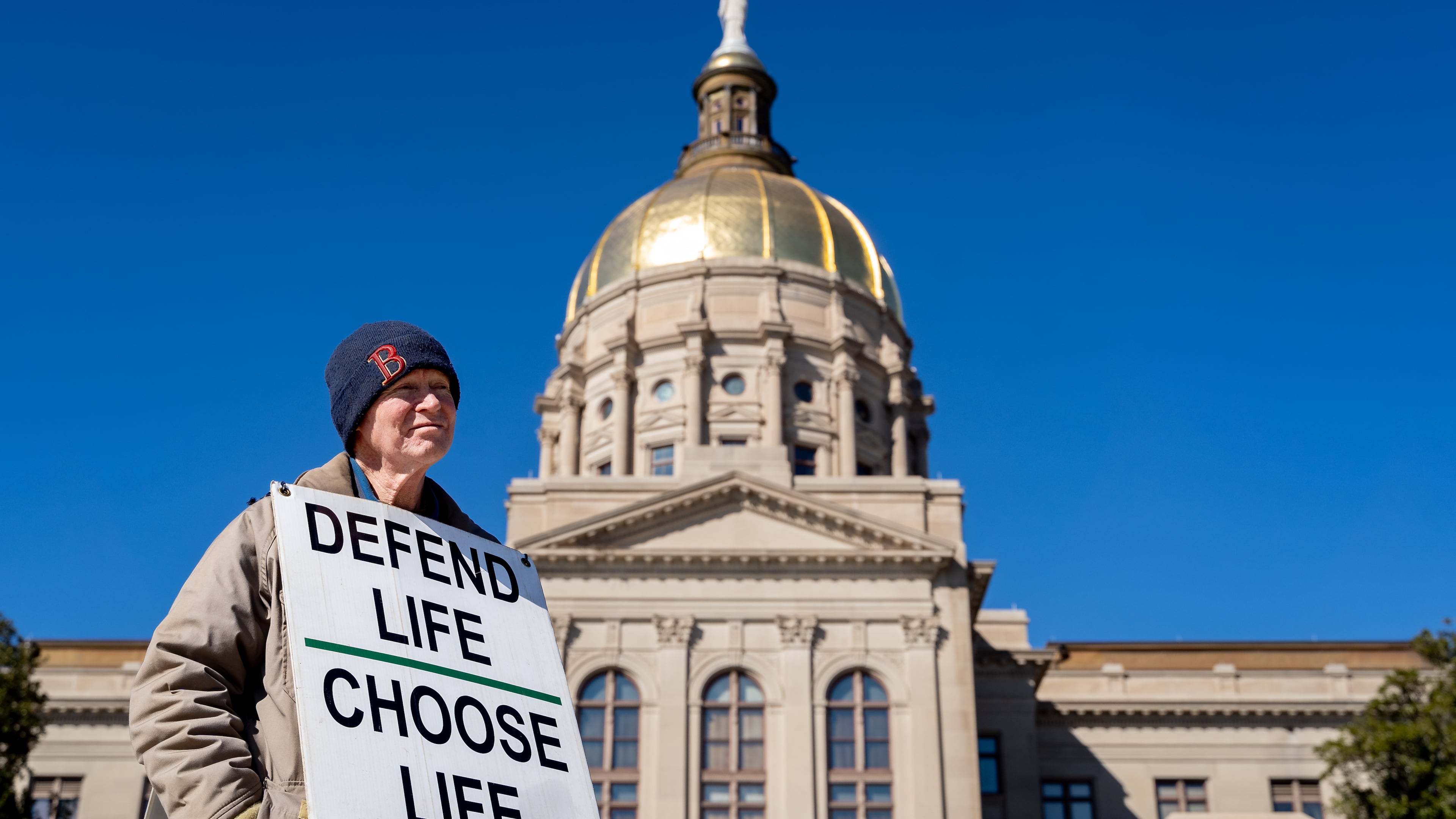 Jack Harvey holds a sign that reads "Protect life Choose Life." Georgia Right To Life held a silent march in the streets of downtown Atlanta to commemorate the anniversary of the 1973 Supreme Court ruling in Roe v Wade, Friday, Jan. 24, 2025 (Ben Hendren for the AJC)