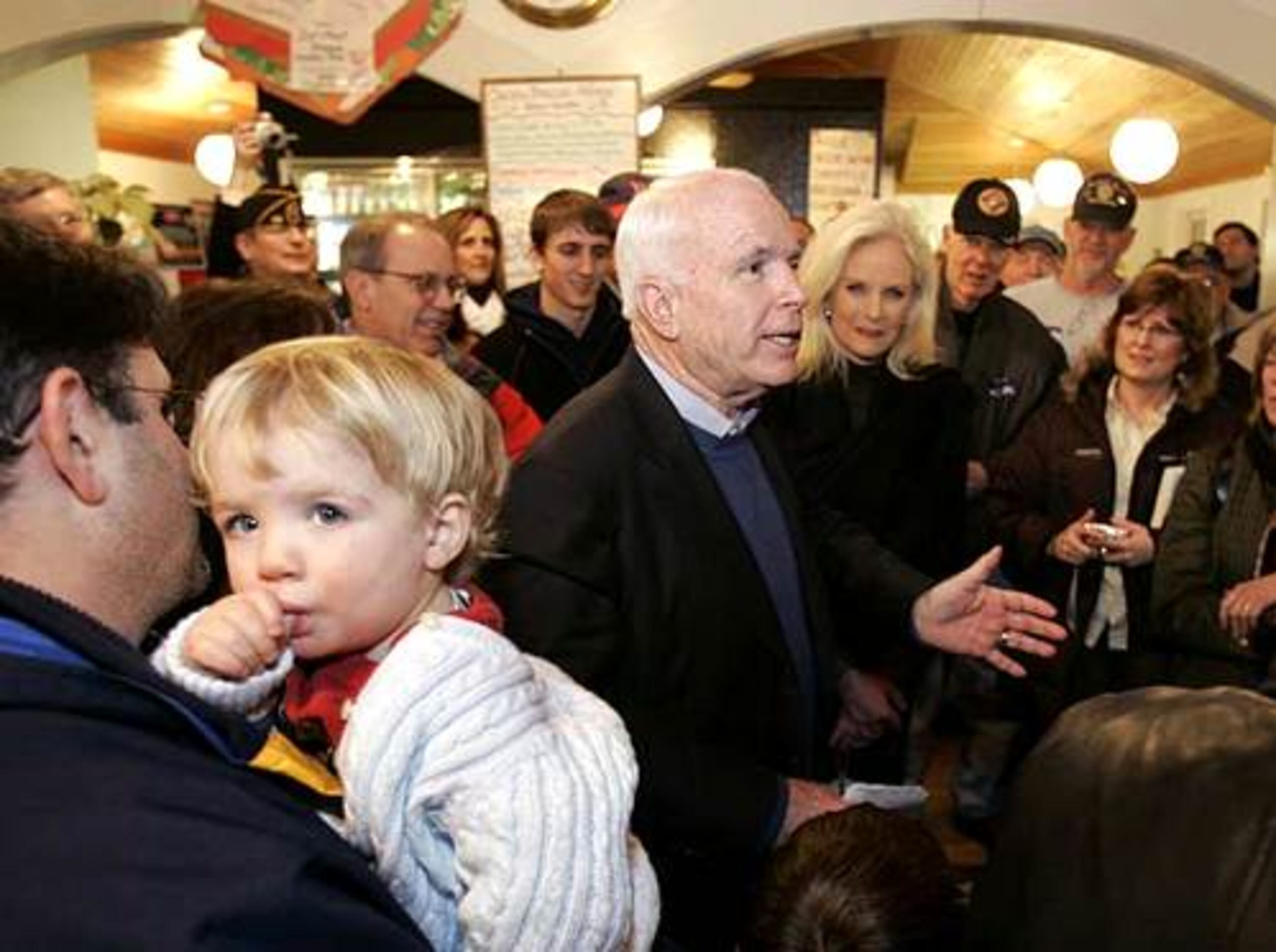 Republican presidential hopeful Sen. John McCain speaks Monday at Joe's Meat Shoppe in North Hampton, N.H.