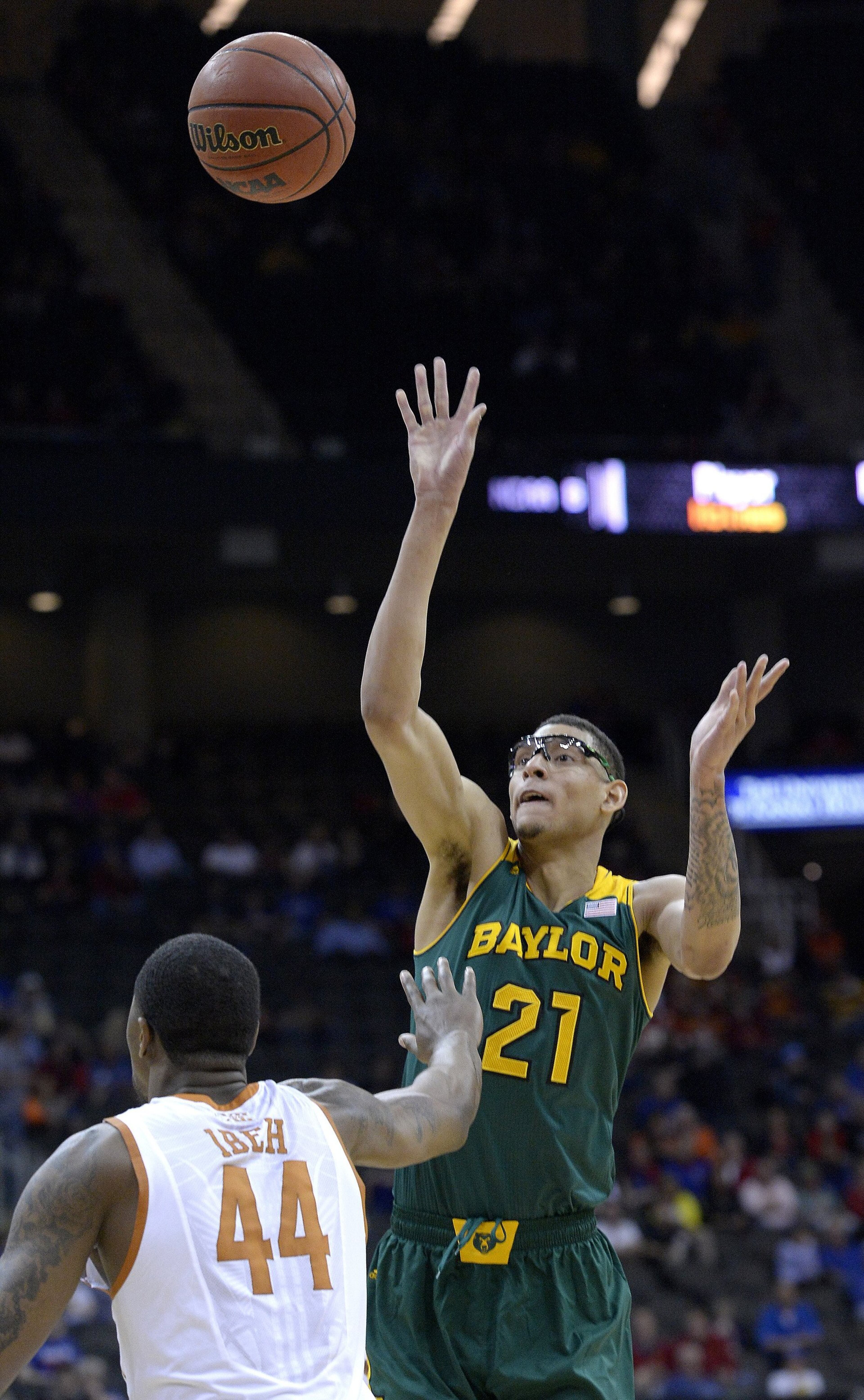 Baylor's Isaiah Austin (21) takes a shot over Texas' Prince Ibeh (44) during the Big 12 Tournament semifinals at the Sprint Center in Kansas City, Mo., on Friday, March 14, 2014.