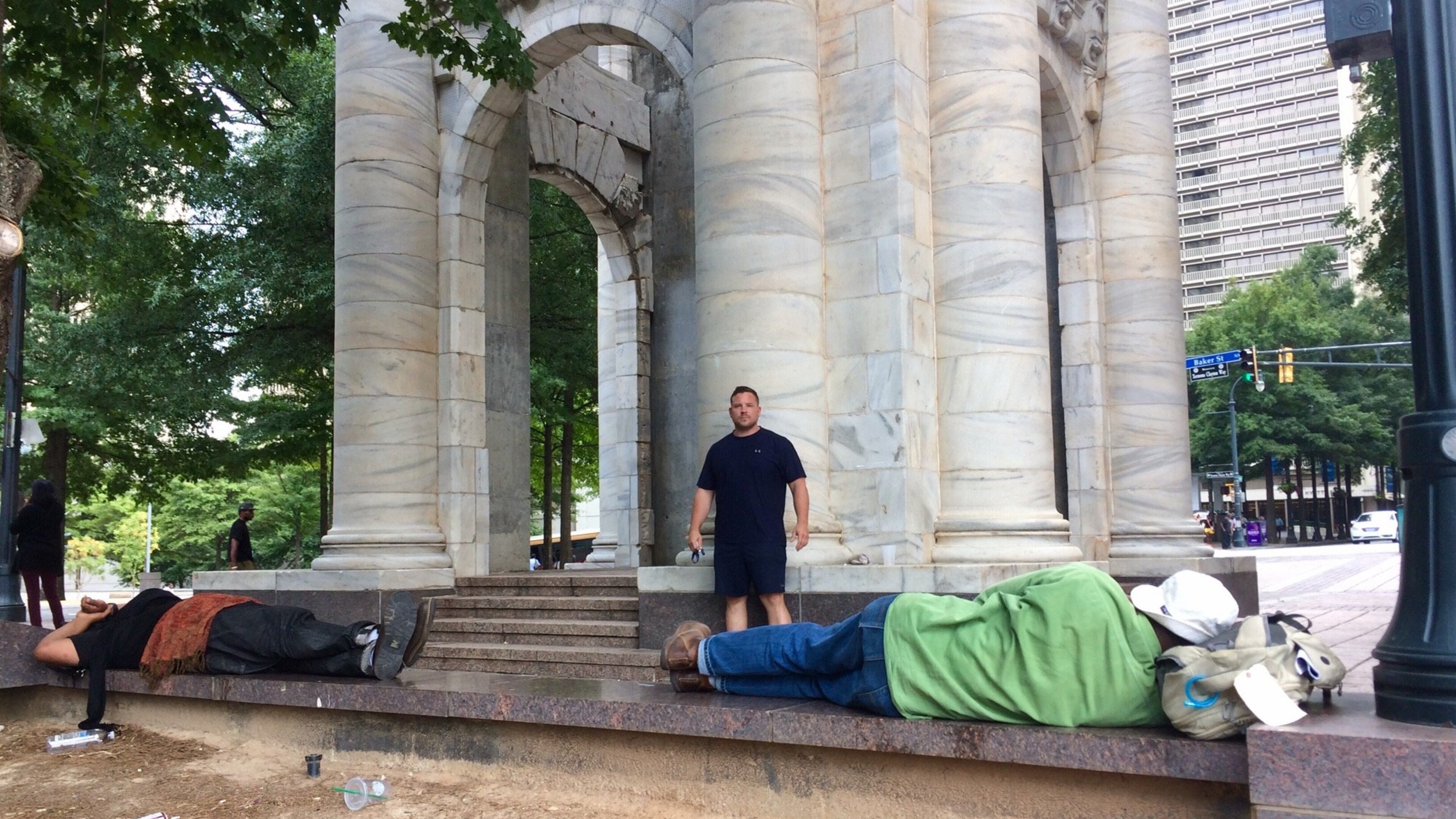 Ryan Toth, who owns or manages several condos at Peachtree Towers, says the residents and businesses have been almost under siege by bad behavior outside their front door. BILL TORPY / BTORPY@AJC.COM