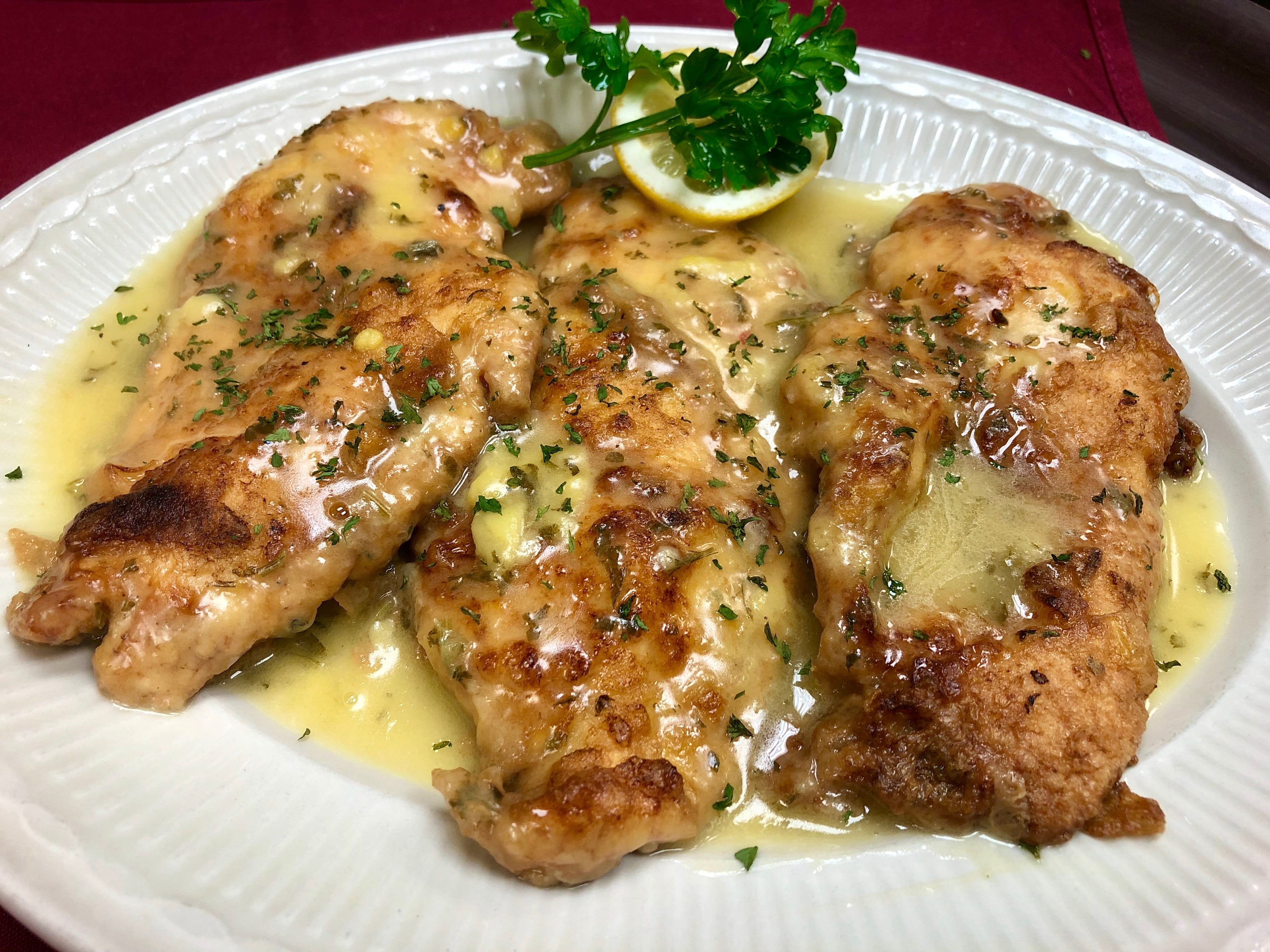 Large portions like that of Casa Nuova's Chicken Francese are signatures of American Italian cuisine. (Courtesy of Casa Nuova)