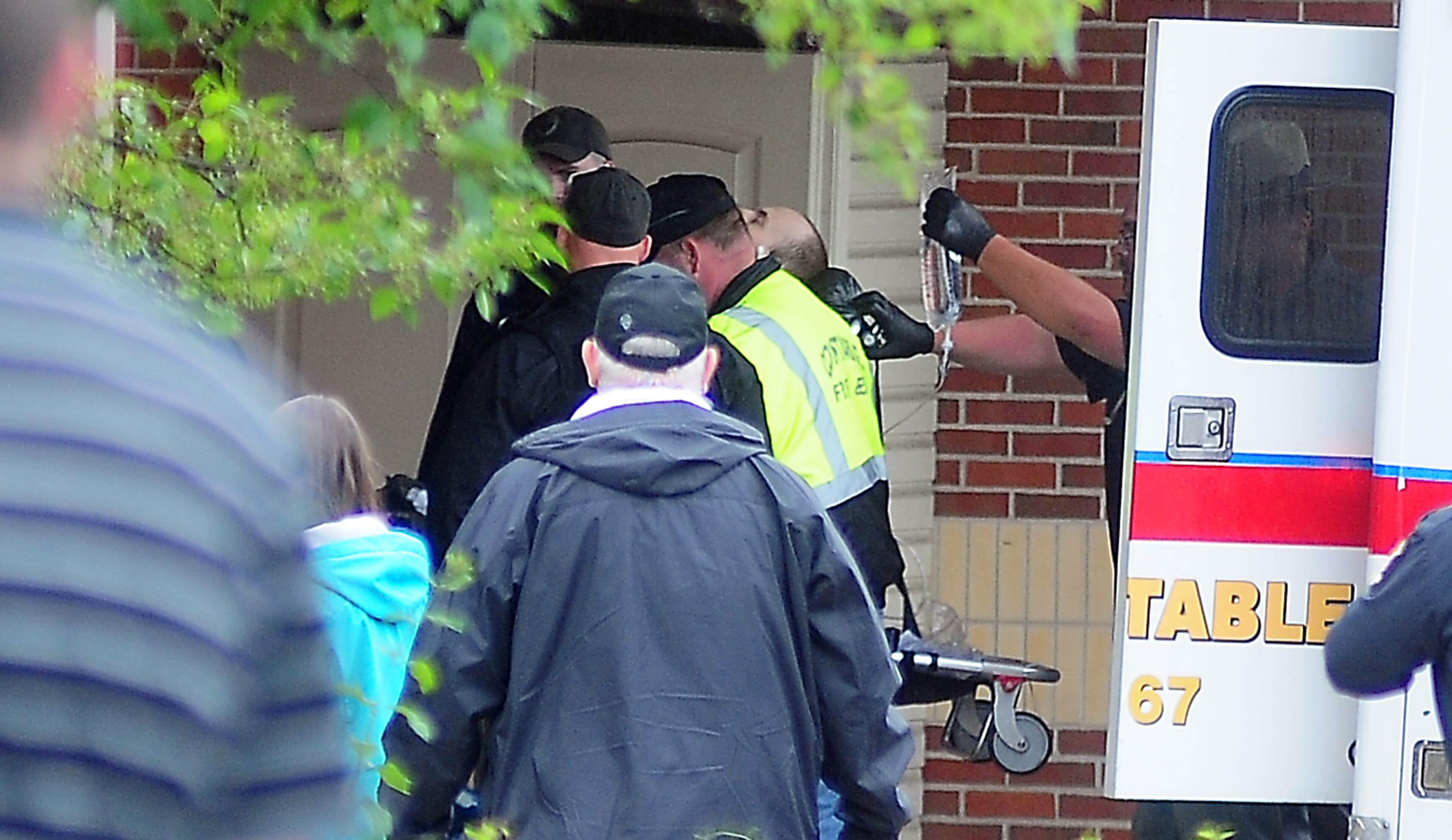Prison escapee David Sweat, is wheeled in to Alice Hyde Medical Center, after being shot and captured Sunday, June 28, 2015, in Malone, N.Y. The second of two convicted murderers who staged a brazen escape three weeks ago from a maximum-security prison in northern New York was captured near the Canadian border on Sunday, two days after his fellow inmate was killed in a confrontation with law enforcement, authorities said. (Rob Fountain/The Press-Republican via AP)