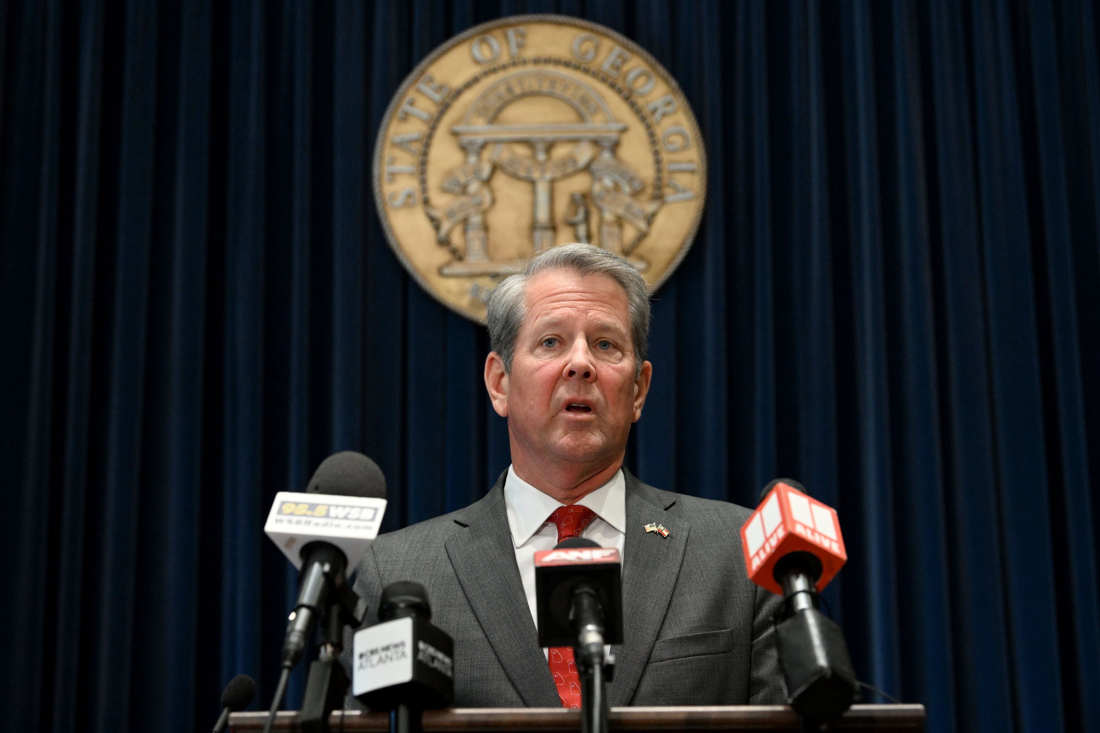Gov. Brian Kemp speaks before signing the state’s new budget at the Georgia State Capitol on Tuesday, May 12, 2026, in Atlanta. He signed the state’s new budget, but not without deleting about $1 billion of spending approved by the General Assembly just last month. (Hyosub Shin/AJC)