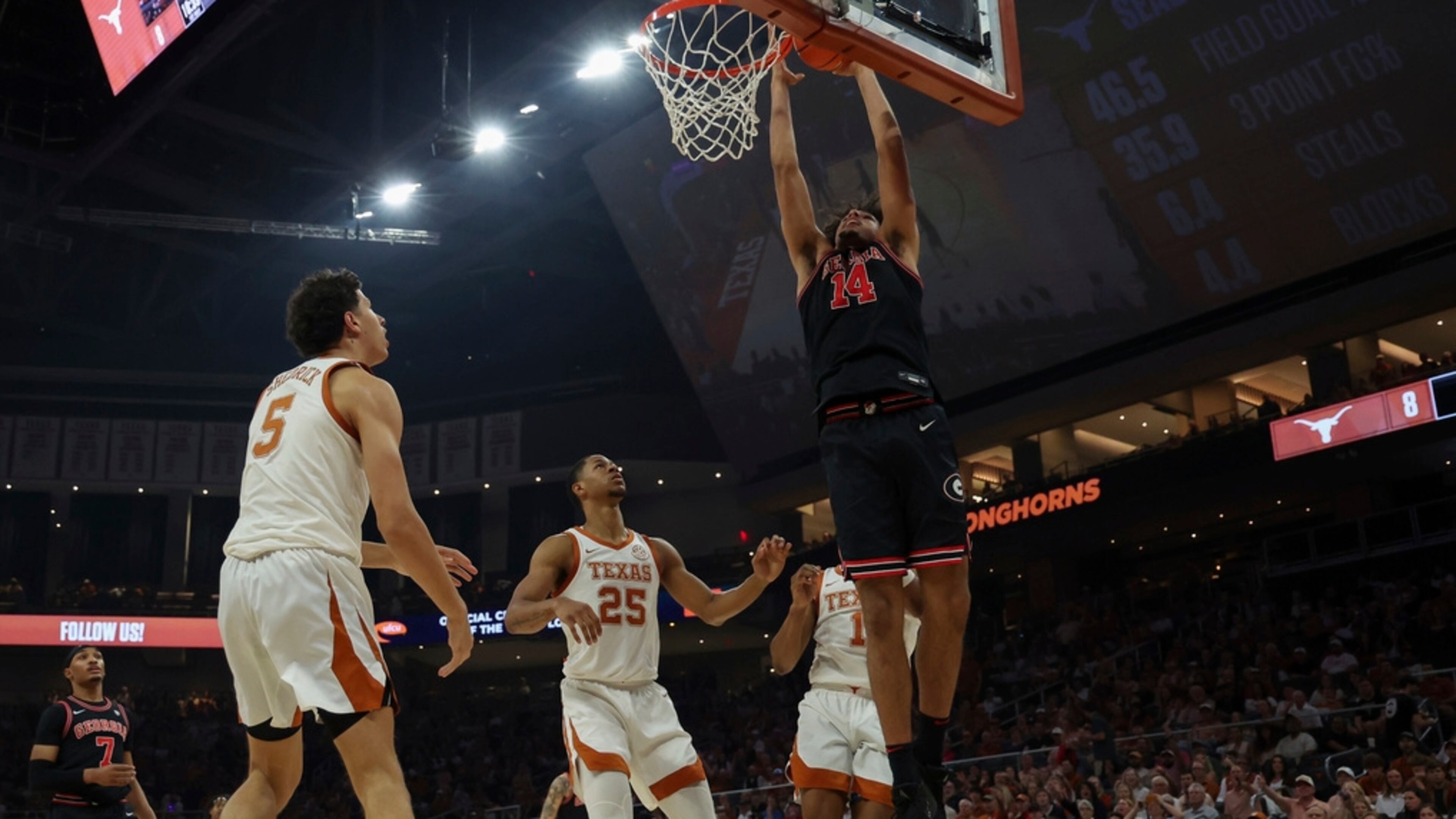 Georgia Bulldogs forward Asa Newell (14) scores during the SEC college basketball game between Texas Longhorns and Georgia Bulldogs on March 1, 2025, at Moody Center in Austin, Texas. (Photo by David Buono/Icon Sportswire) (Icon Sportswire via AP Images)
