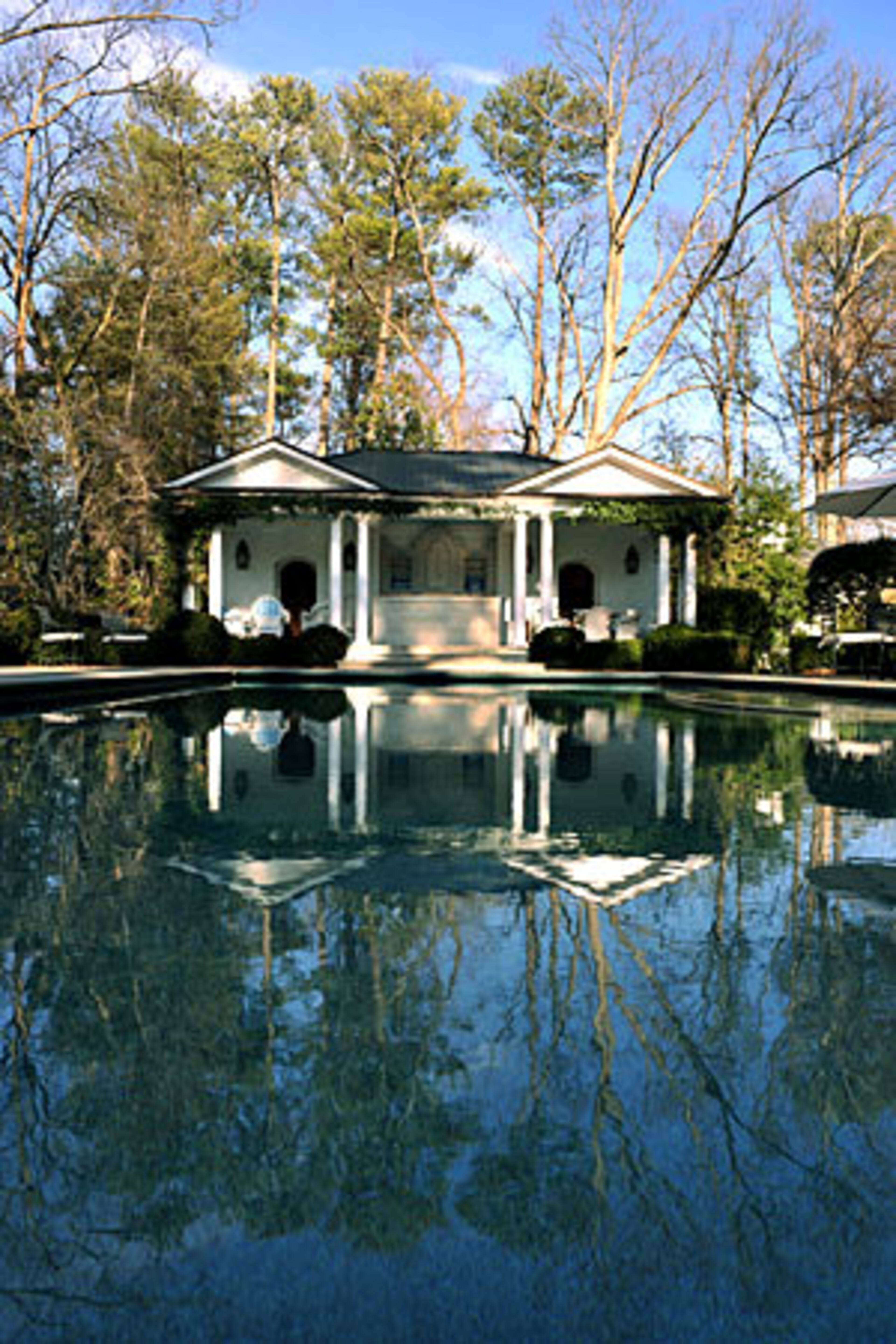 The Millner's pool and pool house were designed by architect Henri Jova of Jova Daniels Busby, one of Atlanta's premier design firms. (Photos of his house come later in this gallery.) The Millners have hosted wedding receptions and spent hours with children and grandchildren at the pool, which is set back on the property.