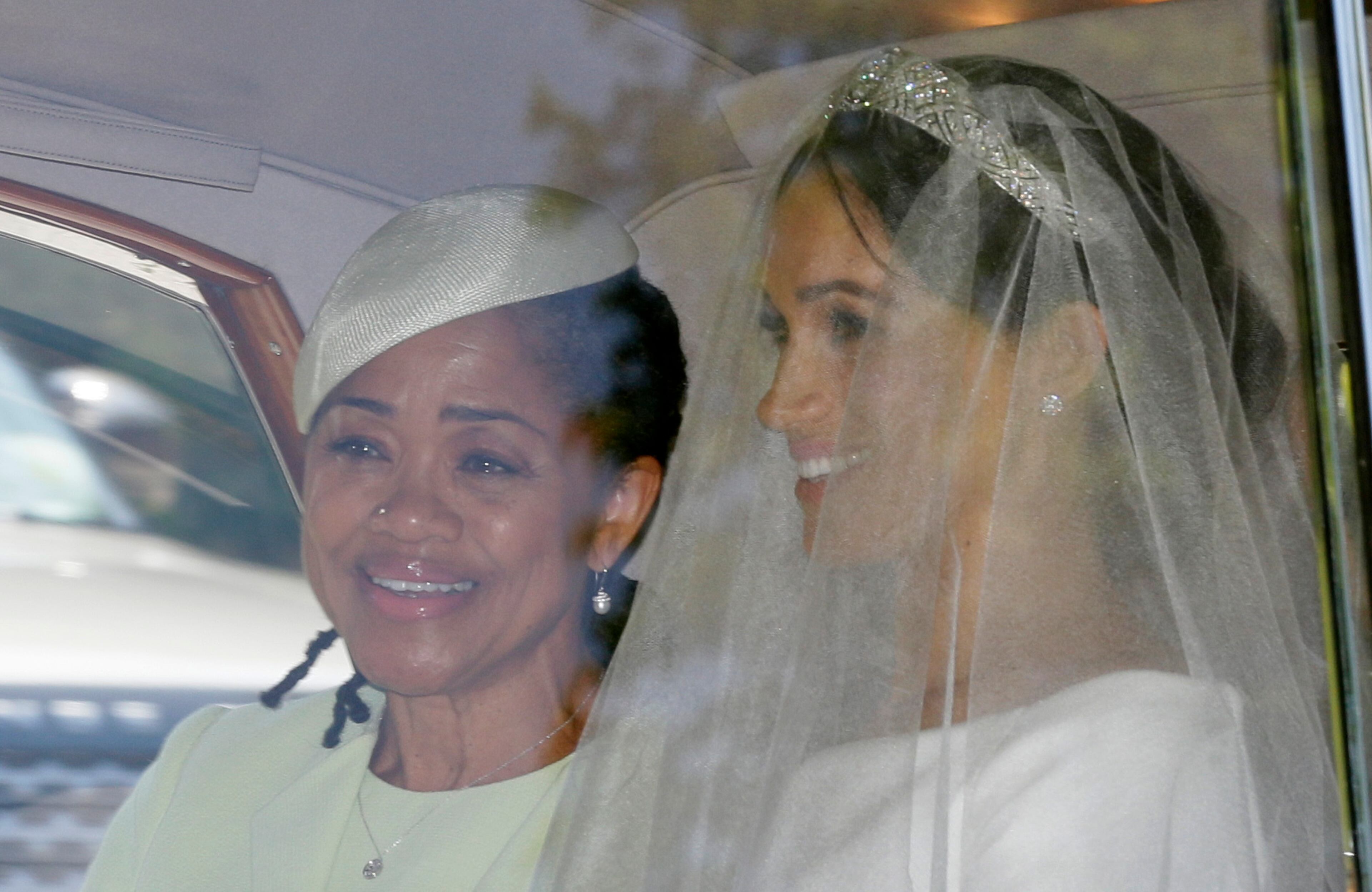 Meghan Markle, right, and her mother Doria Ragland leave Cliveden House Hotel in Taplow, near London, England, Saturday, May 19, 2018 where she stayed before Markle's wedding ceremony with Prince Harry at St. George's Chapel in Windsor Castle. (AP Photo/Tim Ireland)
