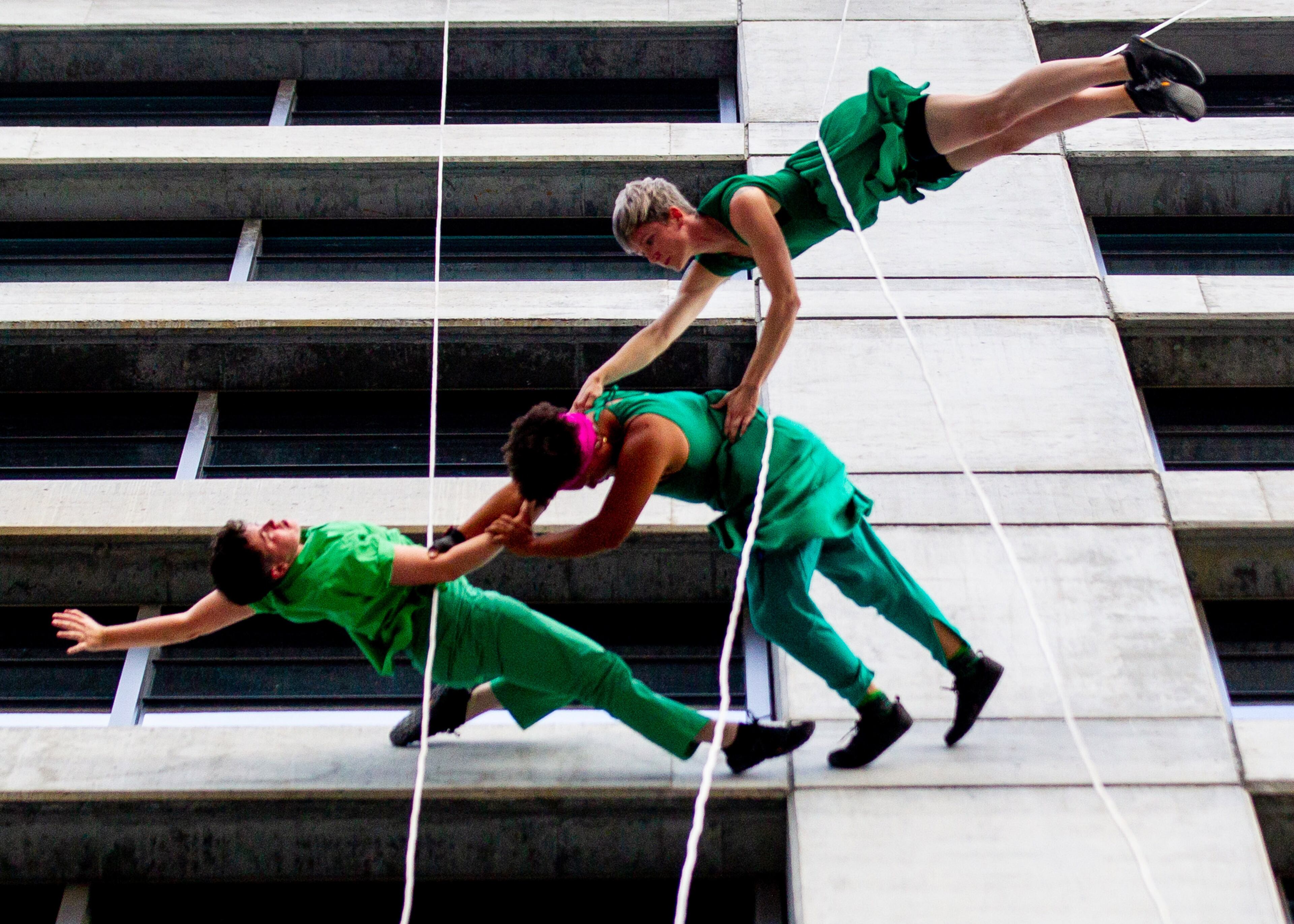Now celebrating its 30th season, Bandaloop transformed the Beltline-facing side of 725 Ponce de Leon Ave. (near Ponce City Market) into a vertical stage for the world premiere of “Field,” featuring spoken word and live music in addition to the troupe’s signature acrobatics. (Photo: Steve Schaefer for The Atlanta Journal-Constitution)