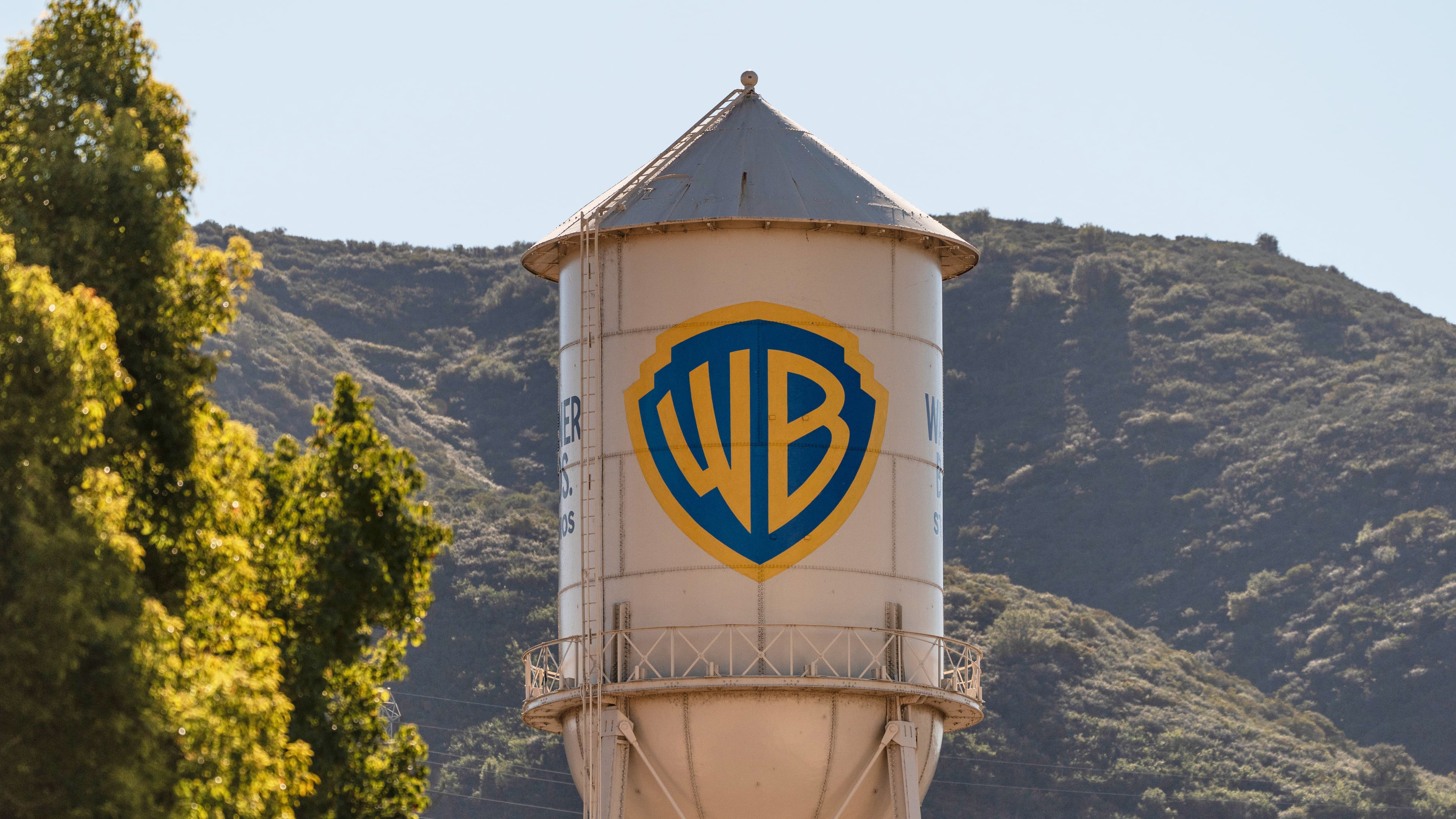FILE - The Warner Bros. water tower appears at Warner Bros. Studios in Burbank, Calif., on Dec. 5, 2025. (AP Photo/Jae C. Hong, File)