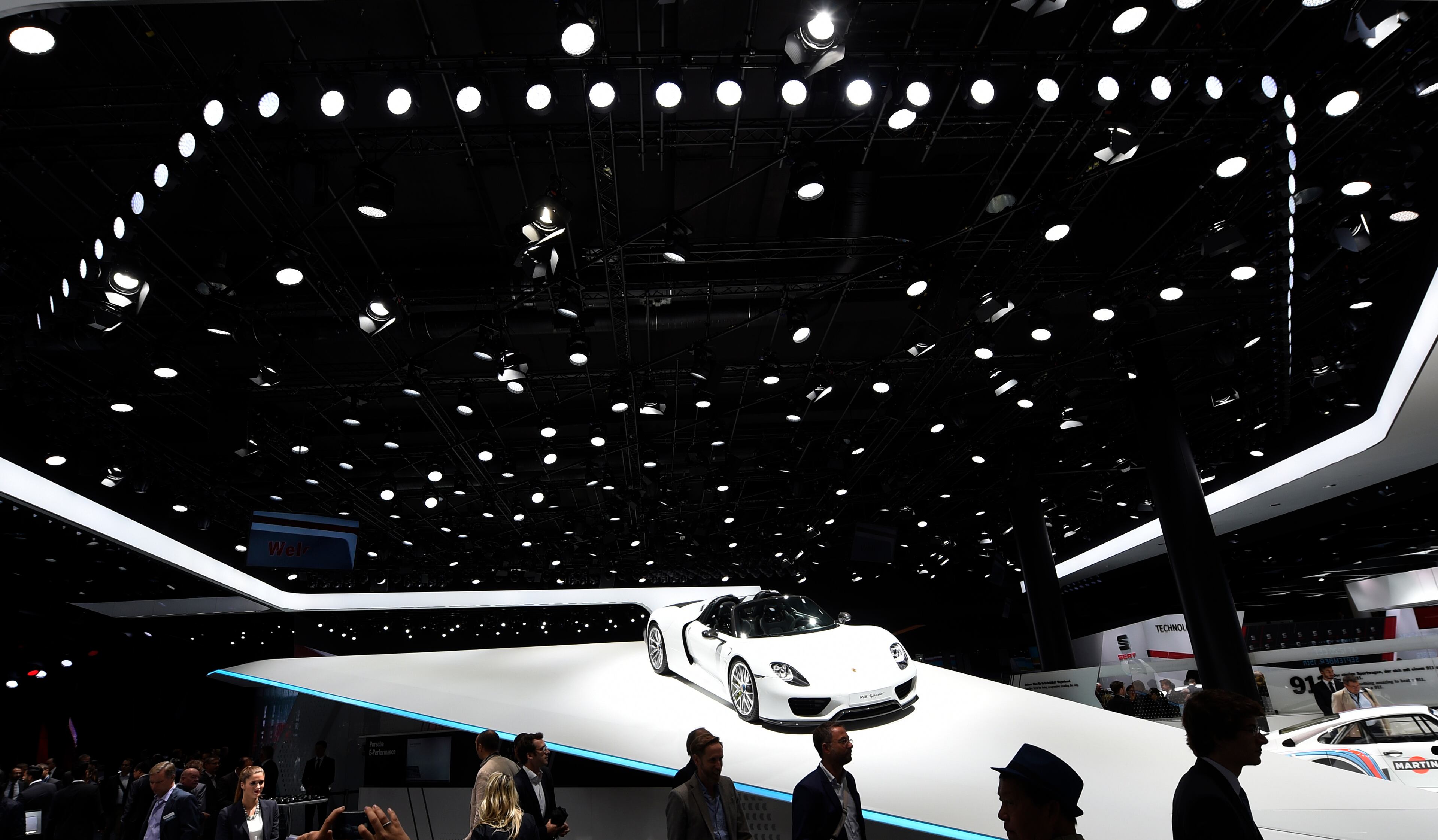 A Porsche 918 Spyder is displayed on the first press day of the Frankfurt Auto Show IAA in Frankfurt, Germany, Tuesday, Sept. 15, 2015. The car show runs through Sept. 27. (AP Photo/Jens Meyer)