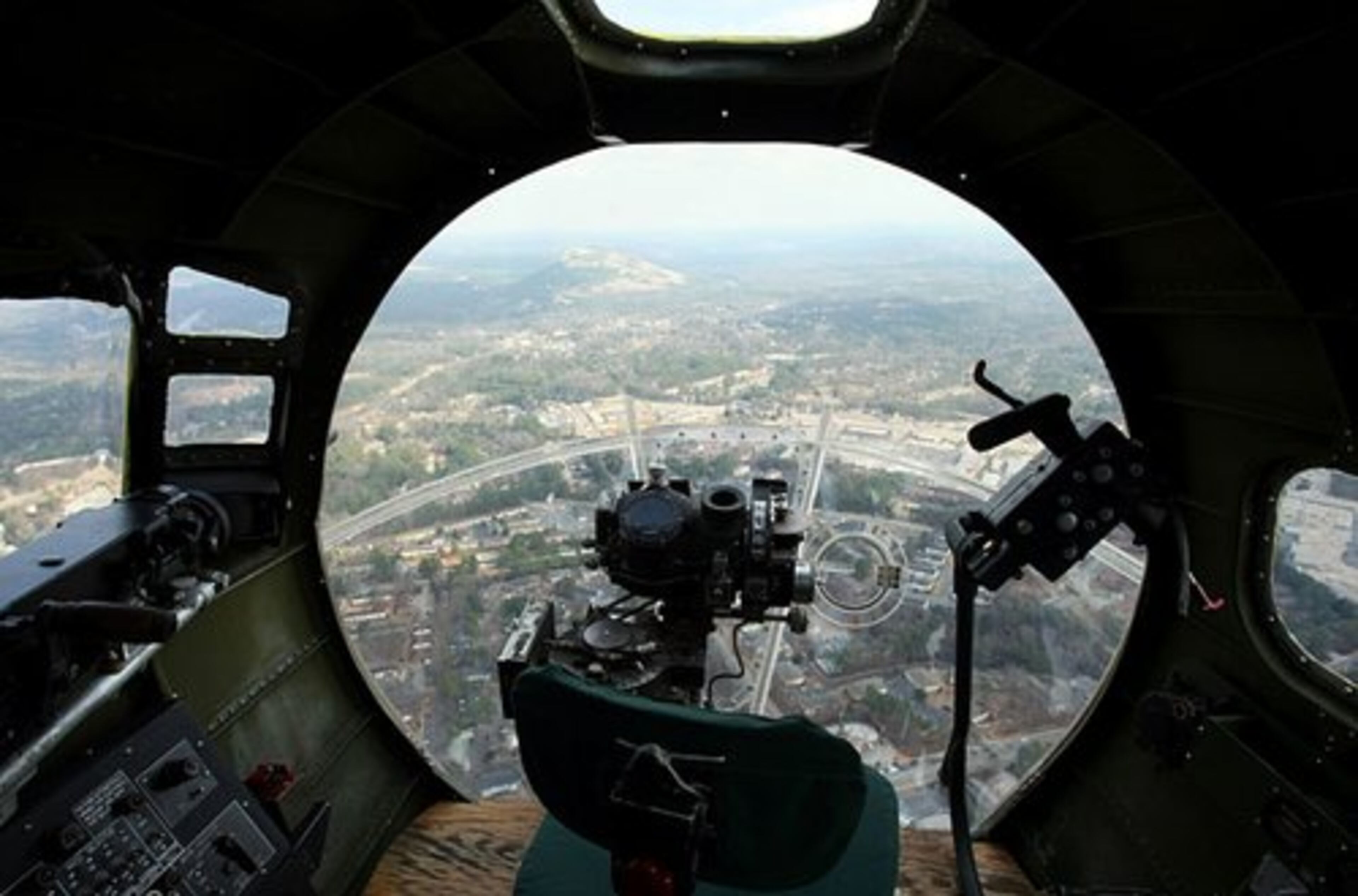 Swift, who sat in the bombadier's seat seen in this photo, specialized in the long runs, all the way to Berlin or Munich, dropping 6,000 to 8,000 pounds of bombs, then flying back to England. Fourteen hours in the air, eight of them over enemy territory, most of them in sub-zero temperature.