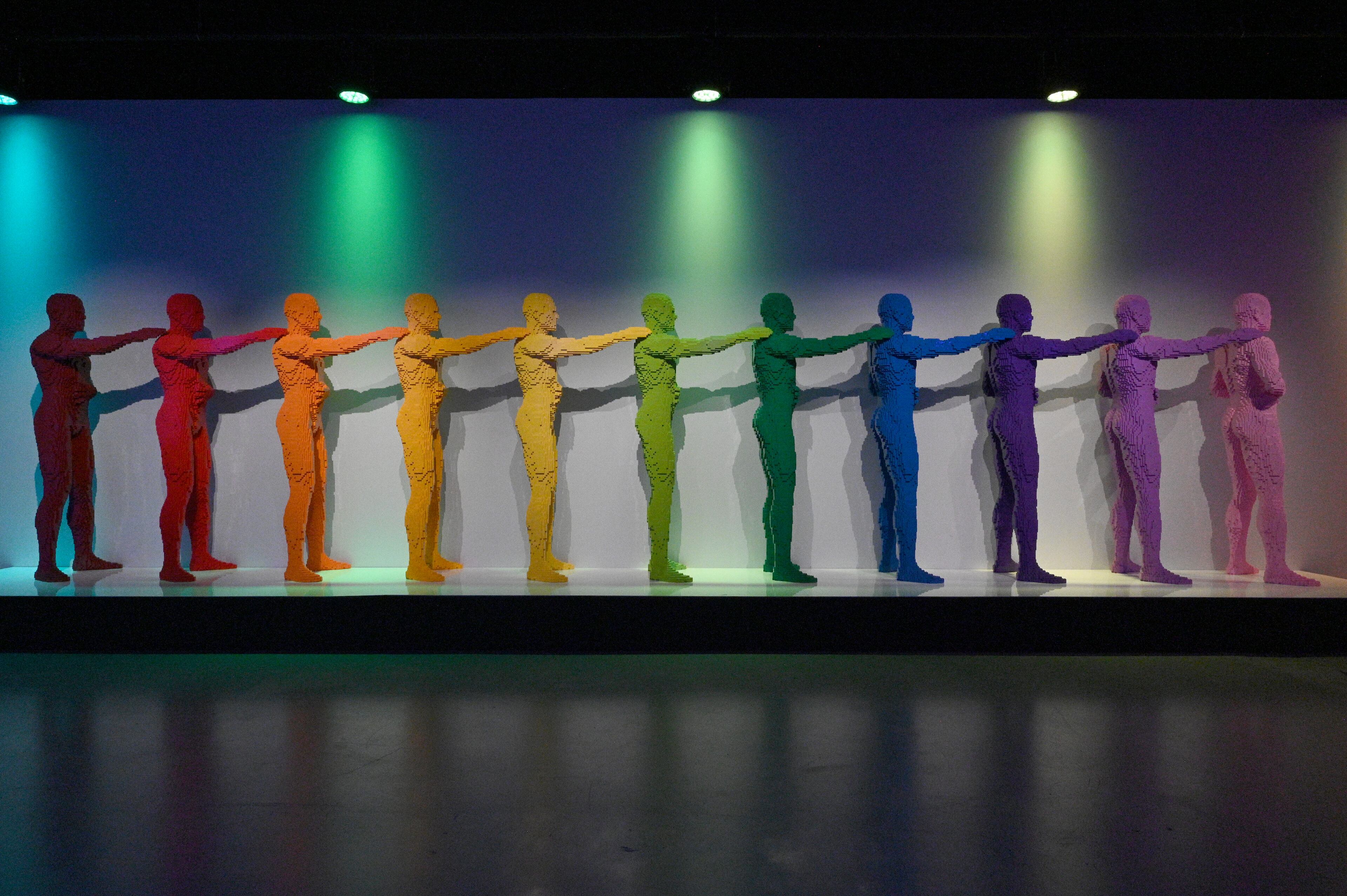 “Rainbow People” made made with 100,245 Lego bricks at "Art of the Brick Immersive Experience" exhibition at Exhibition Hub Atlanta Art Centre, Wednesday, April 19, 2023, in Doraville. The exhibition will feature many pieces and themes, including a room with oversized sculptures (25-foot long), over 70 works of art crafted from more than 1 million LEGO bricks, galleries celebrating human-kind and nature, and a short documentary about how Nathan creates his works. (Hyosub Shin / Hyosub.Shin@ajc.com)