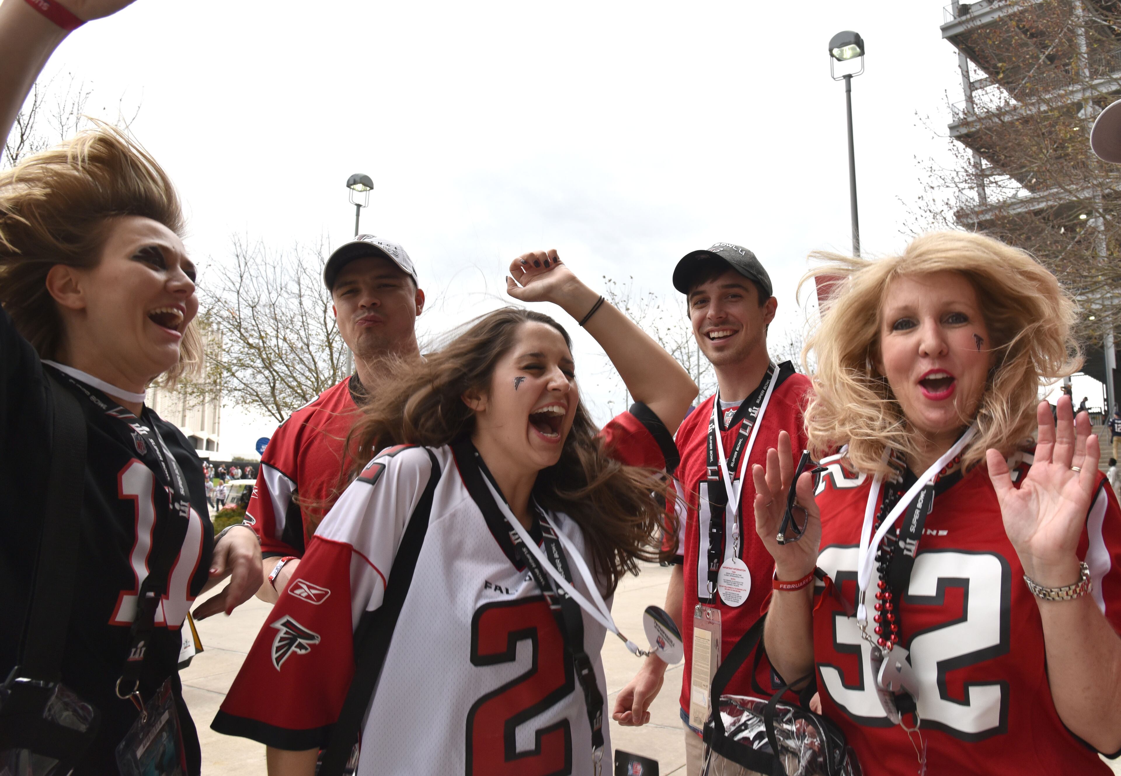 February 5, 2017 Houston, TX - Atlanta Falcons fans cheer outside the NRG Stadium on Sunday, February 5, 2017. Fans gather outside NRG Stadium in Houston Texas before the game where the Atlanta Falcons faced the New England Patriots in Super Bowl 51. HYOSUB SHIN / HSHIN@AJC.COM