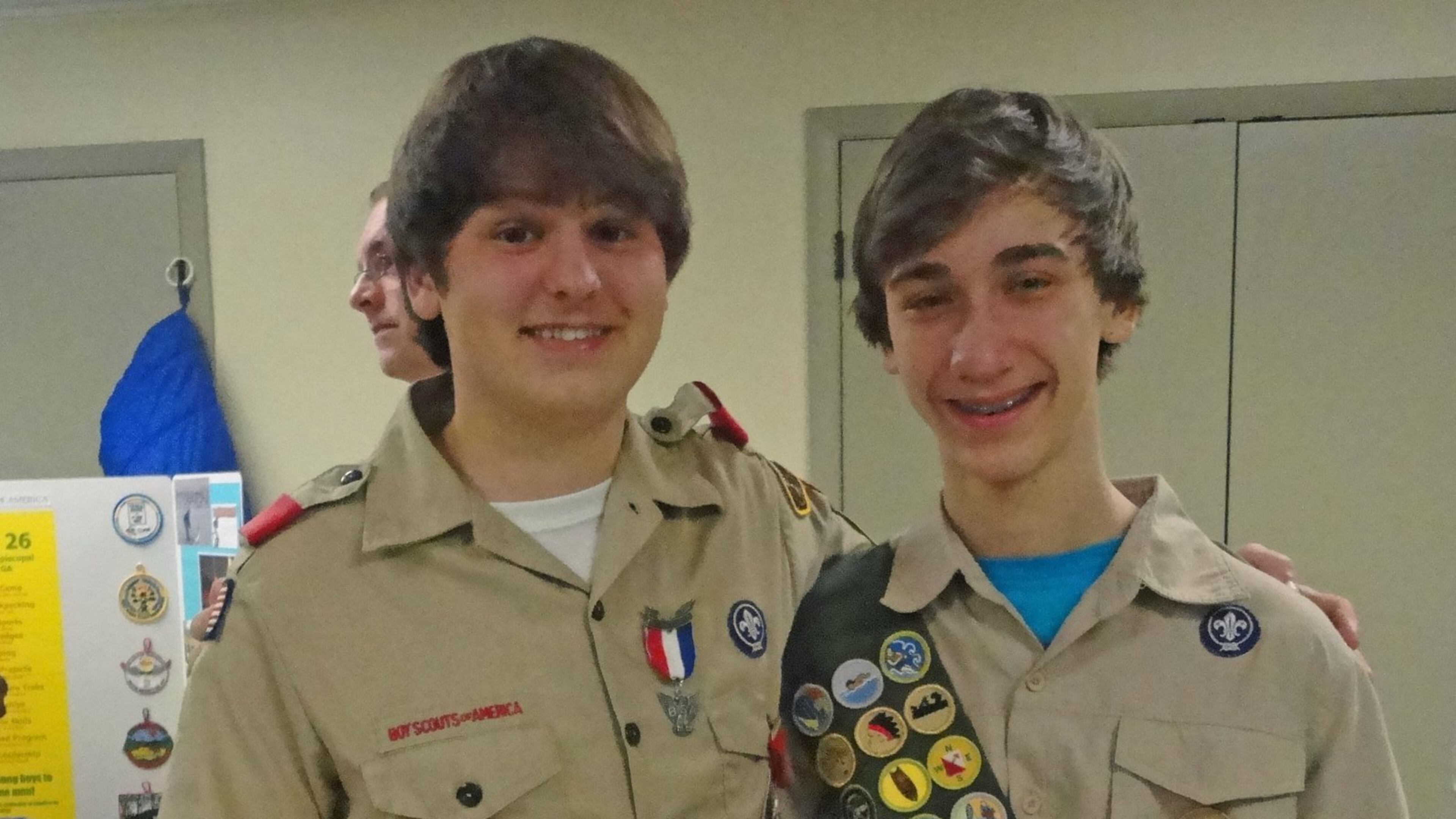 Nathan Henneberg-Verity (left) saved the life of John Allen, scouts in Norcross, during a recent trip and was awarded one of scouting s highest honors.