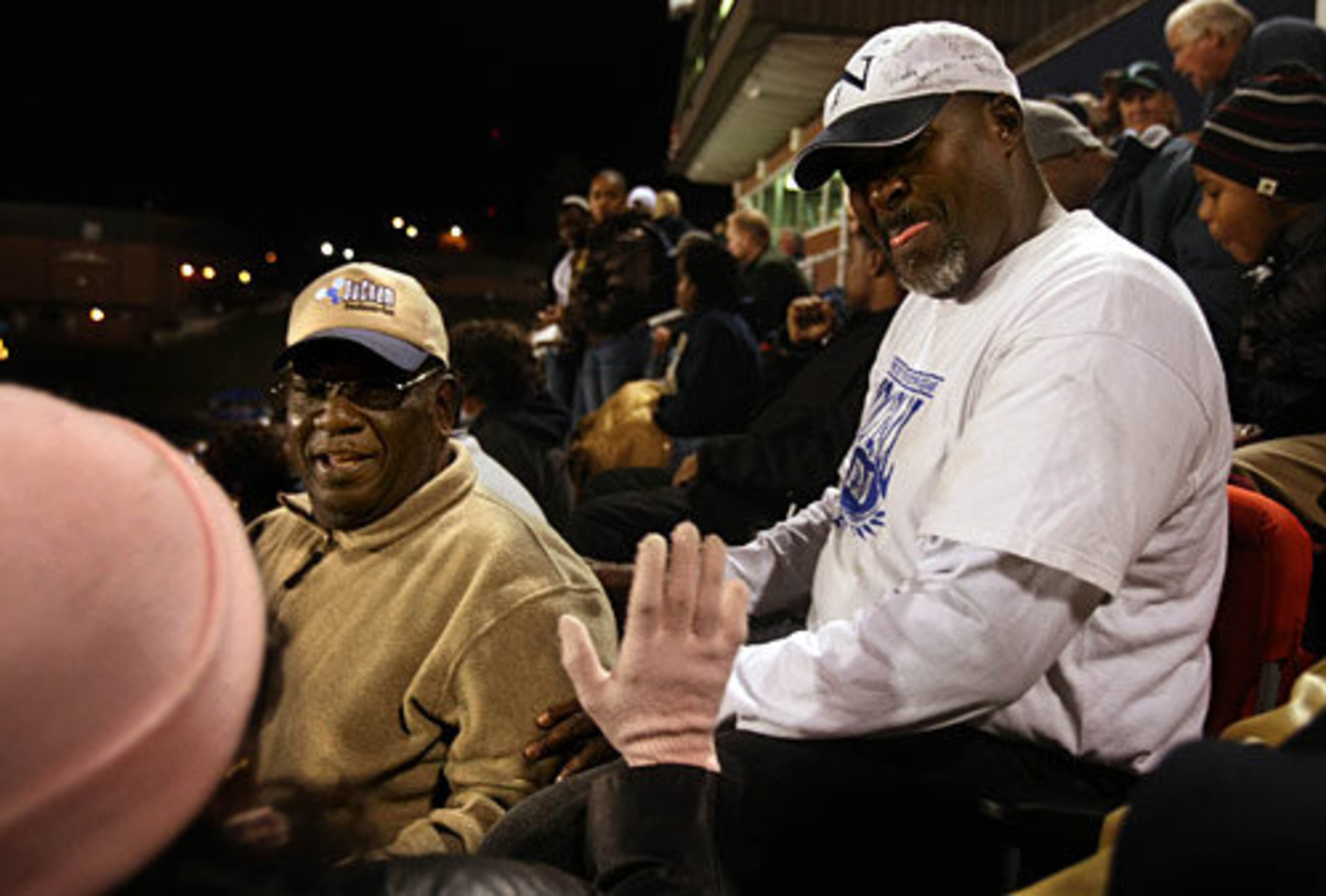 "It's very rewarding to see them (Alec and Alexander) do well," Al Ogletree says of his sons' high school football careers as he chats with friends in the Newnan stands. "I'm proud of them where they're at. I didn't do mine the right way. I couldn't be more happy to be their dad."