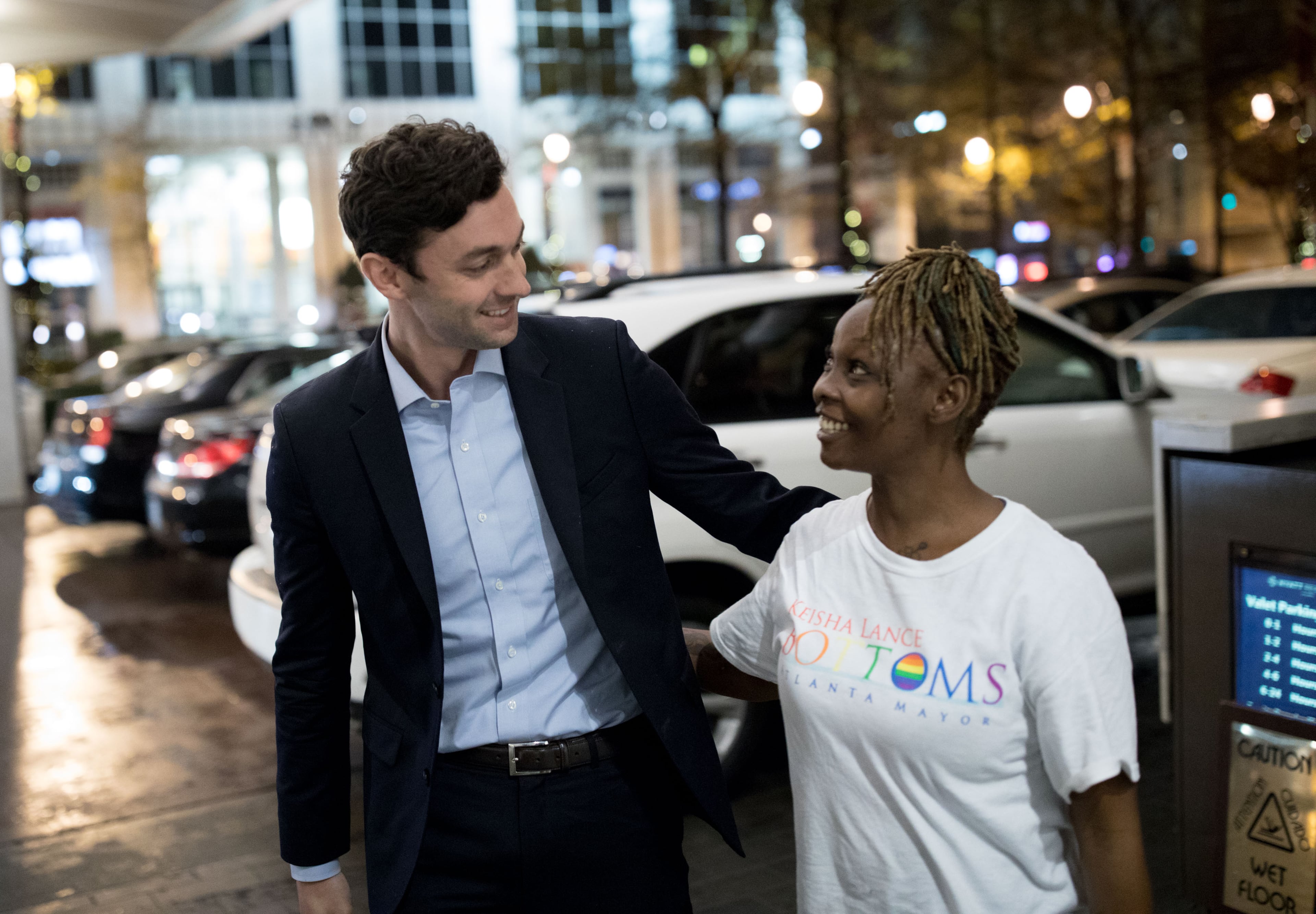 Jon Ossoff, left, greets Charly Aaron as he arrives for an election night party for Atlanta mayoral candidate Keisha Lance Bottoms, who is running against mayoral candidate Mary Norwood, at the Hyatt Regency Hotel, Tuesday, Dec. 5, 2017, in Atlanta. BRANDEN CAMP/SPECIAL
