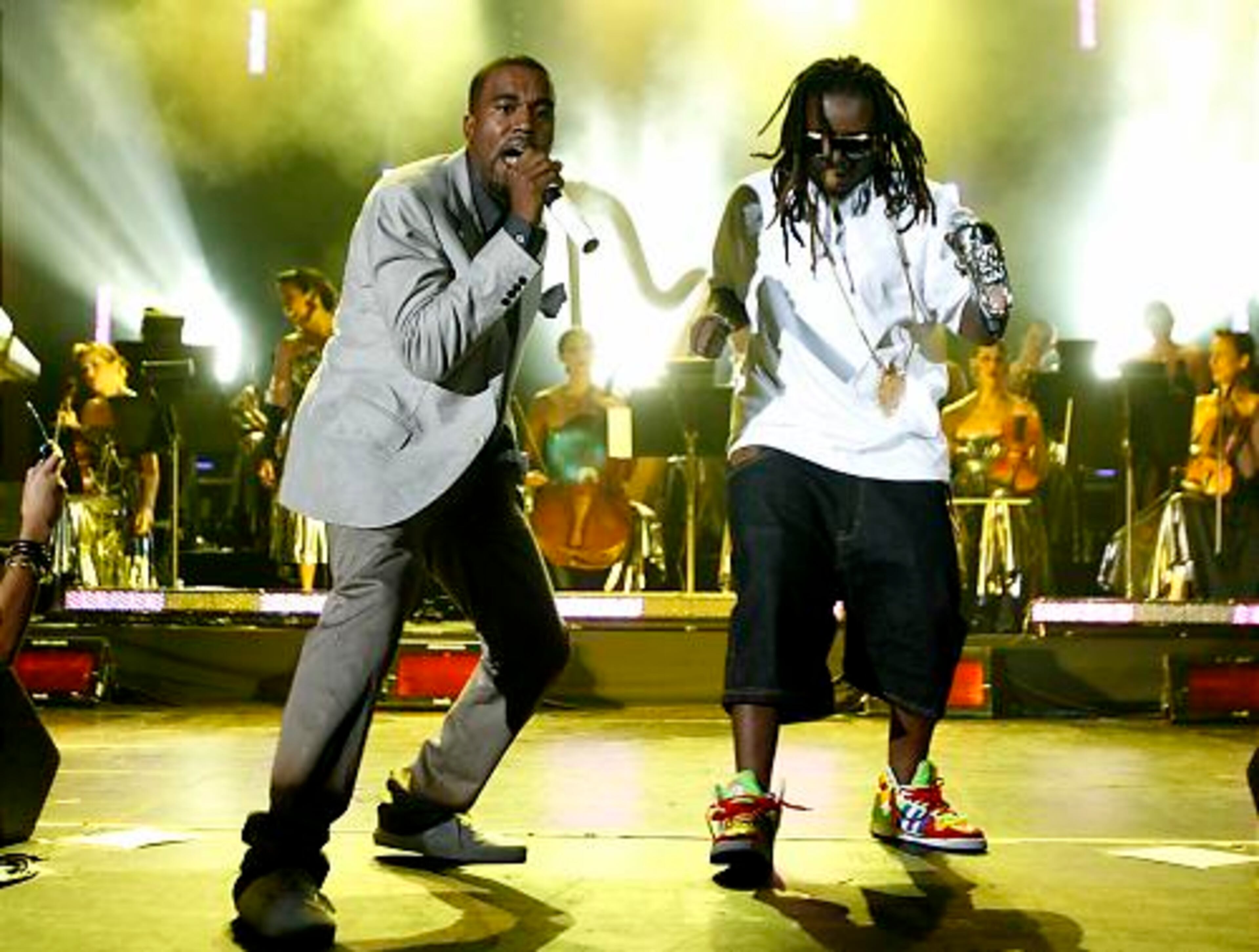 Kanye West (left) and T-Pain perform during Rolling Stone magazine's 40th anniversary VIP party at the Hard Rock Hotel & Casino in Las Vegas on Sunday. The party was part of the festivities during the MTV Video Music Awards weekend.