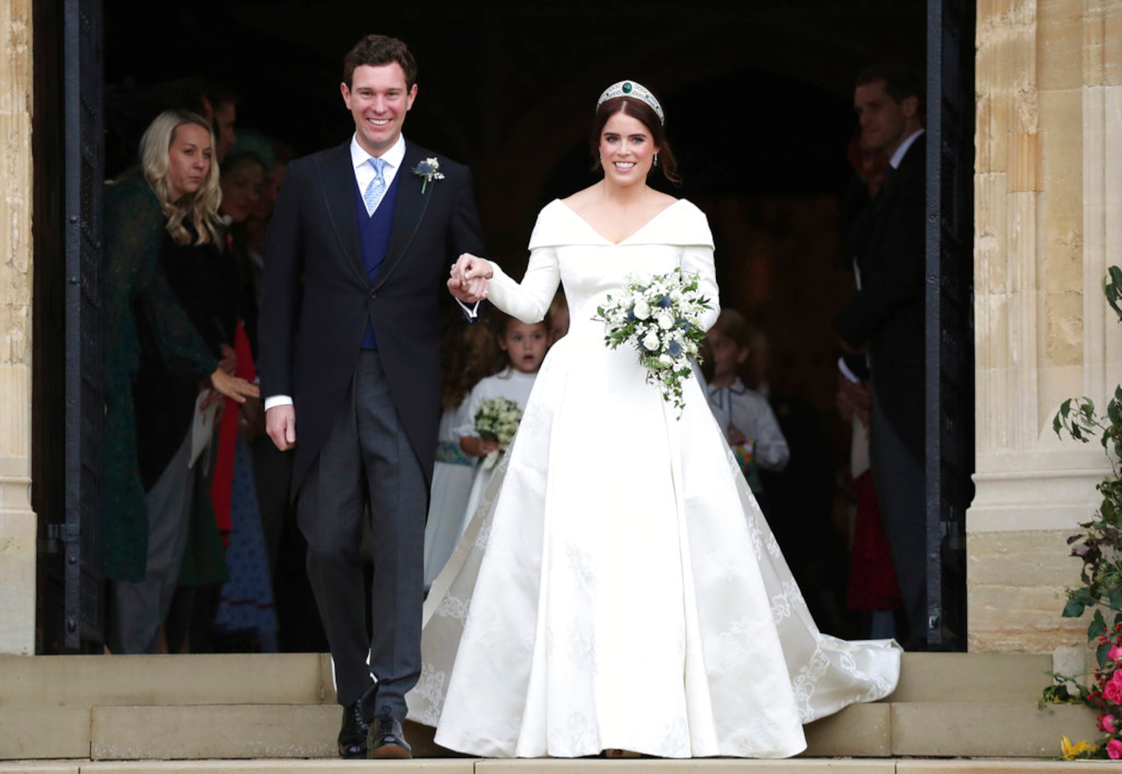 Princess Eugenie of York and Jack Brooksbank after their wedding ceremony at St Georgeâs Chapel, Windsor Castle, near London, England, Friday Oct. 12, 2018. (Steve Parsons, Pool via AP)