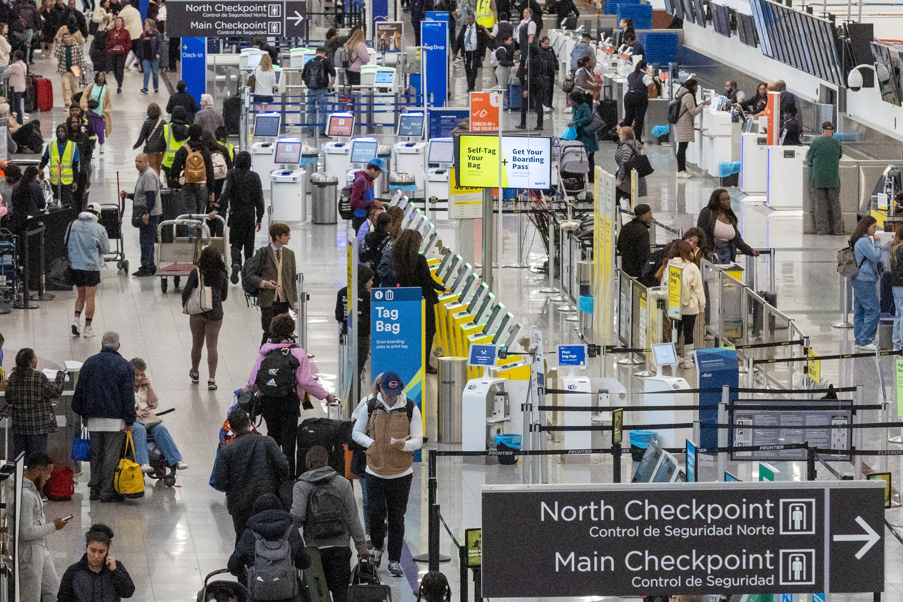 Travelers make their way through Hartsfield-Jackson Atlanta International Airport on Wednesday, Nov. 22, 2023. An estimated 85,000 travelers were expected to pass through the airport the day before Thanksgiving. (Steve Schaefer/steve.schaefer@ajc.com)