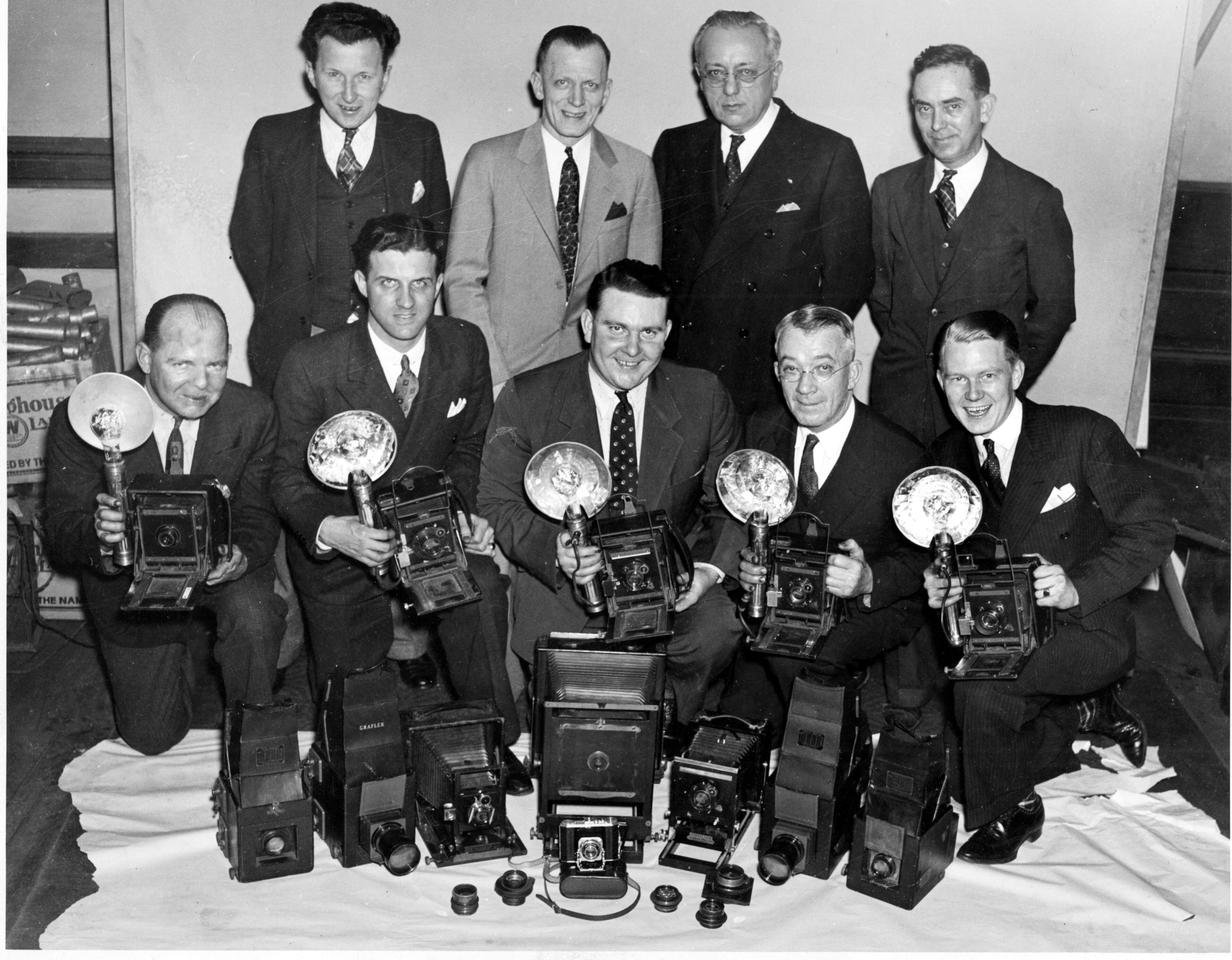Walter Frank Winn (back row, third from left) was hired by The Atlanta Journal in 1909 to set up the newspaper's photo department. He worked for the Journal until his death in 1939. During his 30-year career, Winn captured enduring images from all aspects of life around Atlanta and the state of Georgia. Here's a look at the AJC's rich archival collection of historic scenes tagged, quite simply, "Staff photo by Winn." And here's the Journal photo staff in 1937, the original photo caption reading: "This battery of photographers is on the jump 24 hours a day, recording the news in pictures for Journal readers. Left to right, front row, Frank Rhodes, Ralph Jones, Lawrence Cornett, Walter Sparks, and Victor Barron. Back row, Lamar Caldwell, H.G. Blasingame, Walter F. Winn and S.T. Jones."