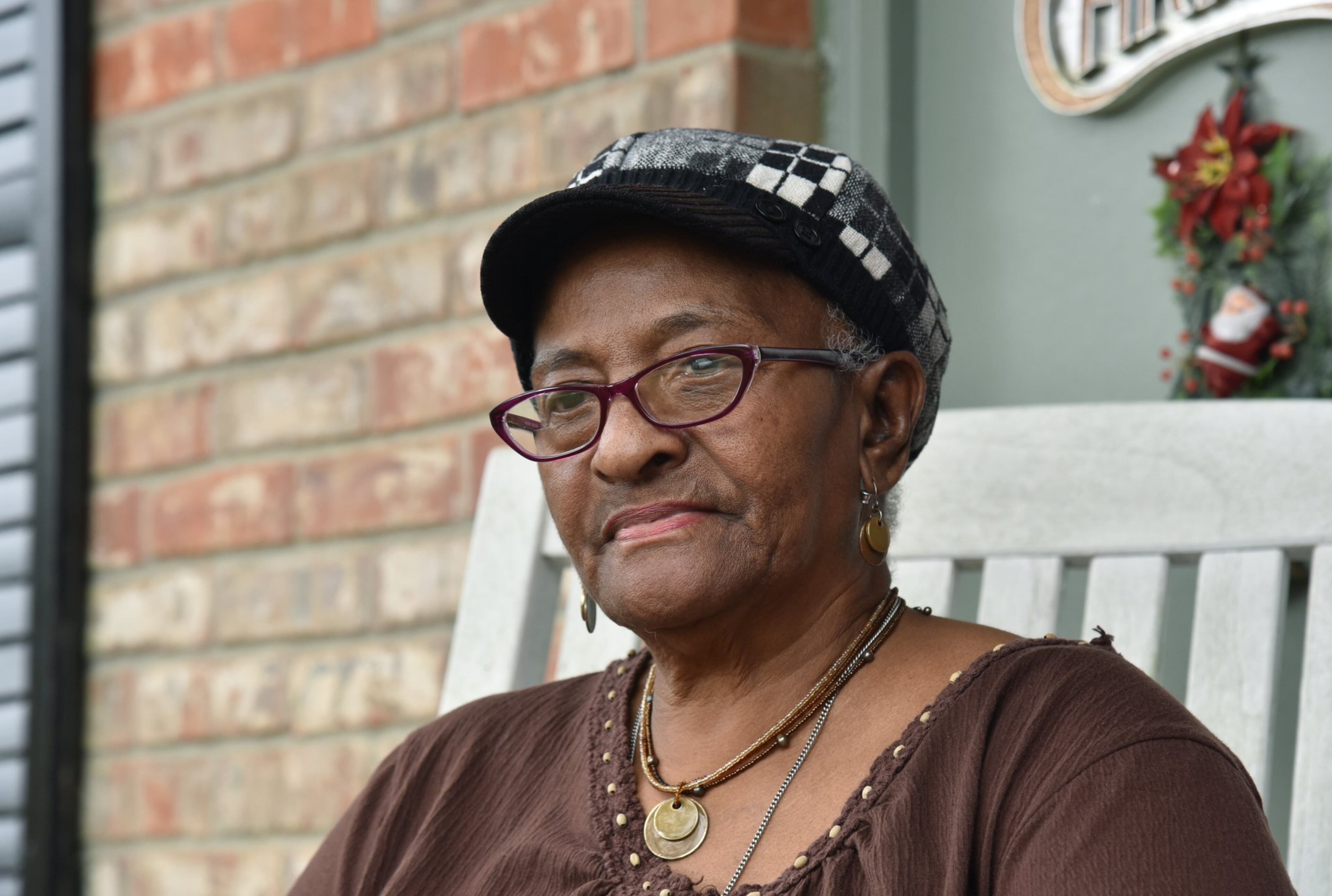 Maggie Coleman, a voter who has missed elections since her neighborhood precinct closed in 2015, at her home near Fort Gaines on Dec. 10, 2019. HYOSUB SHIN / HYOSUB.SHIN@AJC.COM