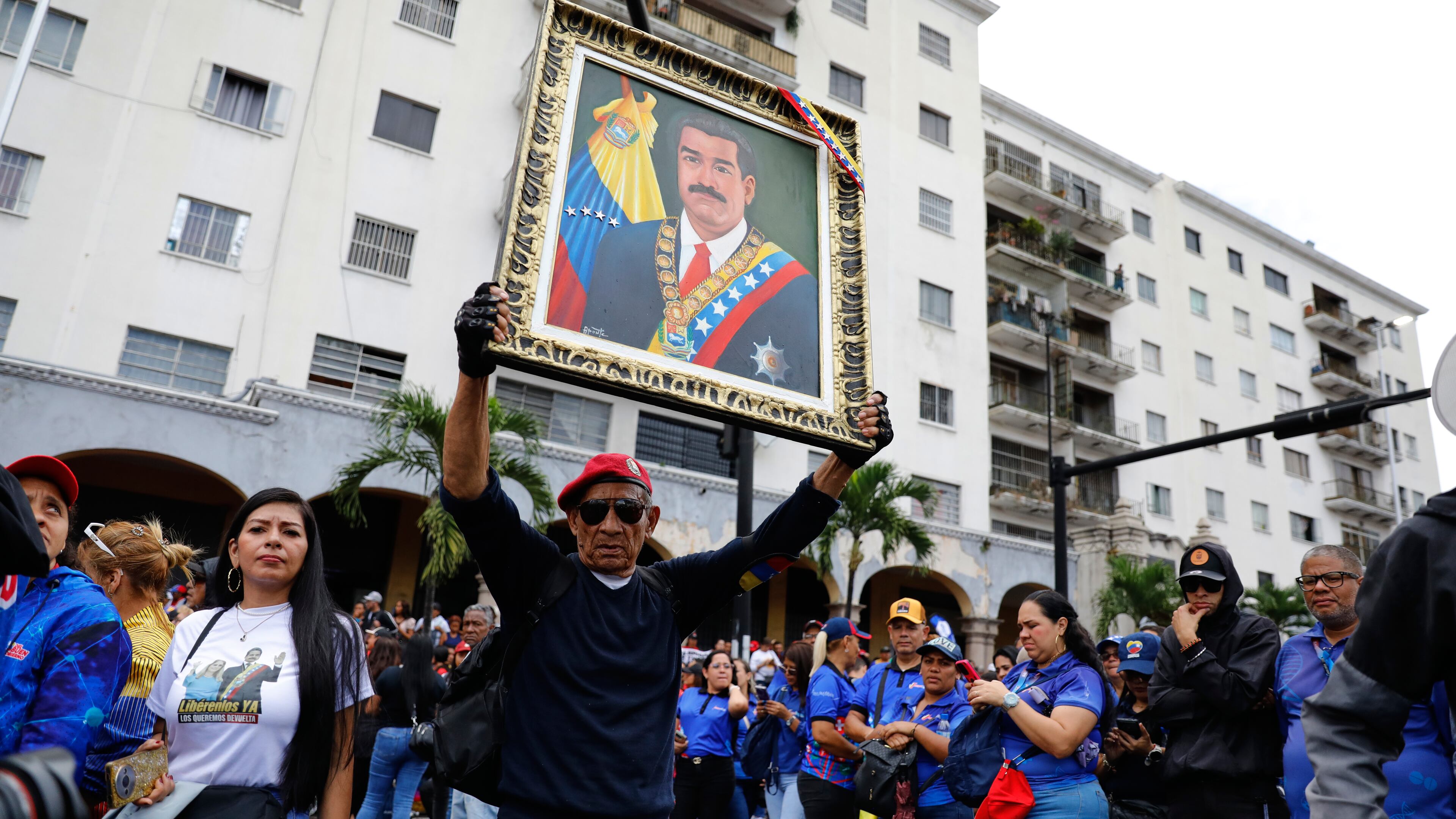 Supporters of former Venezuelan President Nicolas Maduro rally calling for his release as he faces trial in the United States after being captured by U.S. forces, in Caracas, Venezuela, Friday, Jan. 14, 2026. (AP Photo/Cristian Hernandez)