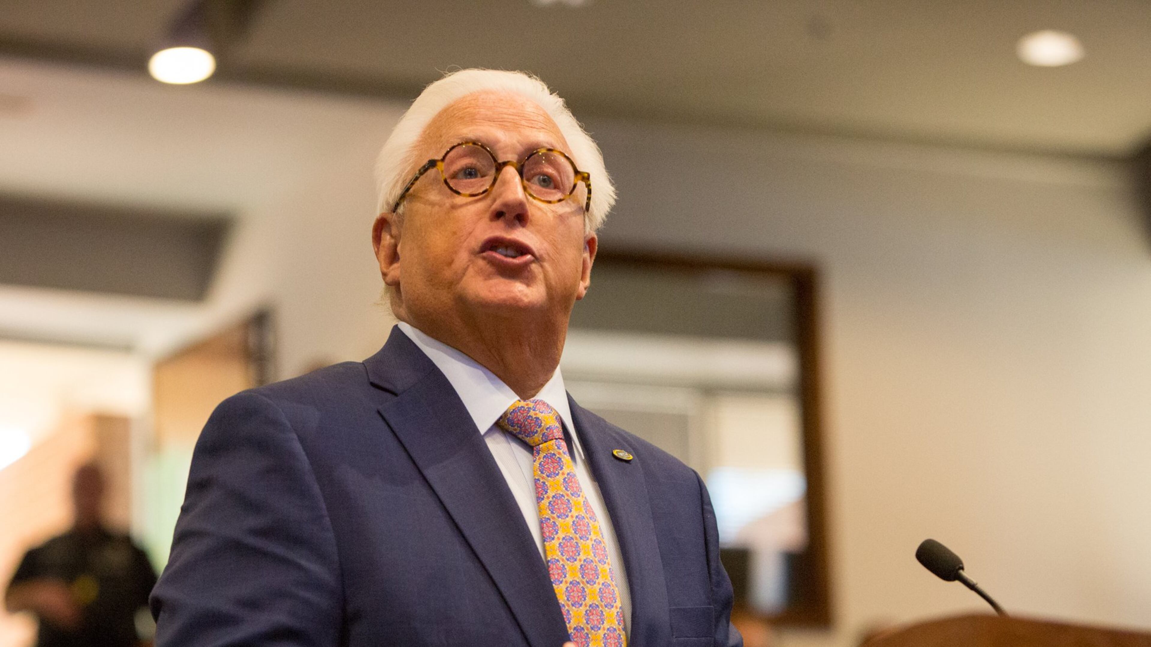 MUST Ministries President & CEO Dr Dwight “Ike” Reighard addresses the Marietta City Council during the meeting where the Council decided to grant his organization’s request to build a 130-bed new homeless shelter. PHIL SKINNER