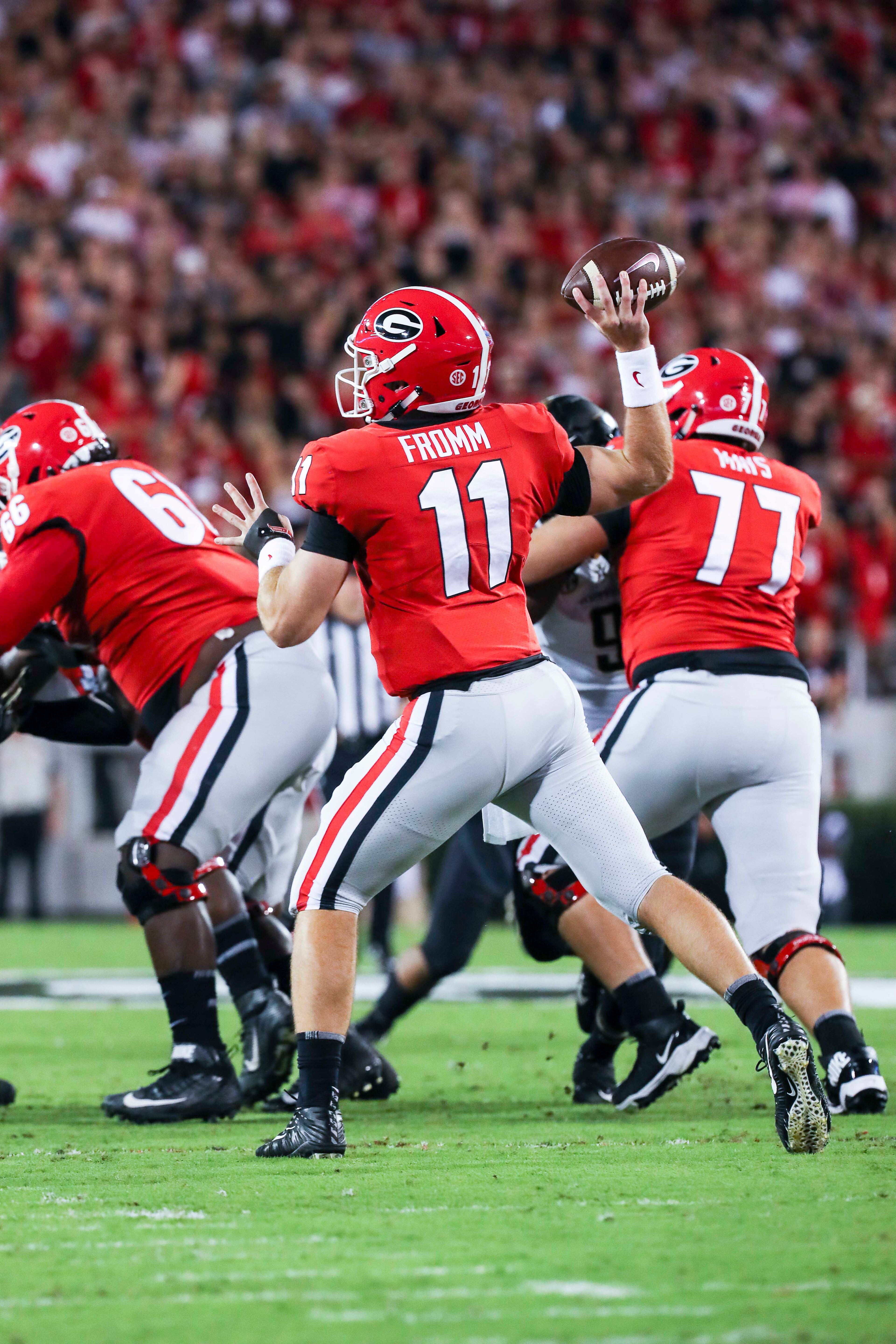 10/06/2018 -- Athens, Georgia -- Georgia quarterback Jake Fromm (11) prepares to throw the ball against Vanderbilt during the first quarter of a NCAA college football game at Sanford Stadium in Athens, Saturday, October 6, 2018. (ALYSSA POINTER/ALYSSA.POINTER@AJC.COM)