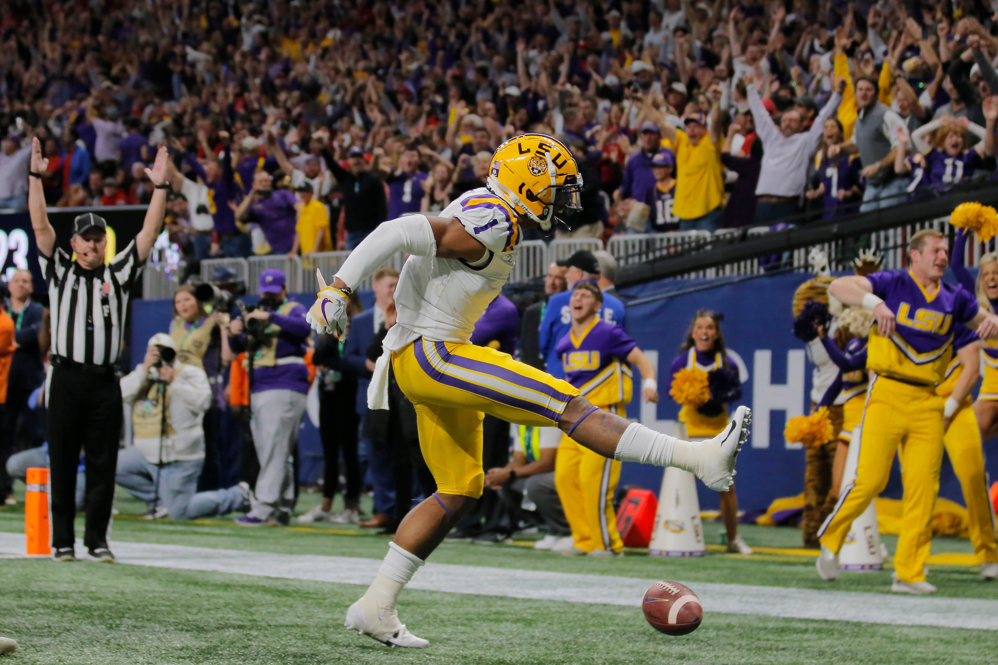 LSU Tigers wide receiver Ja'Marr Chase (1) celebrates a touchdown during the first half of the Georgia vs. LSU SEC Football Championship game at Mercedes-Benz Stadium in Atlanta. Alyssa Pointer / alyssa.pointer@ajc.com