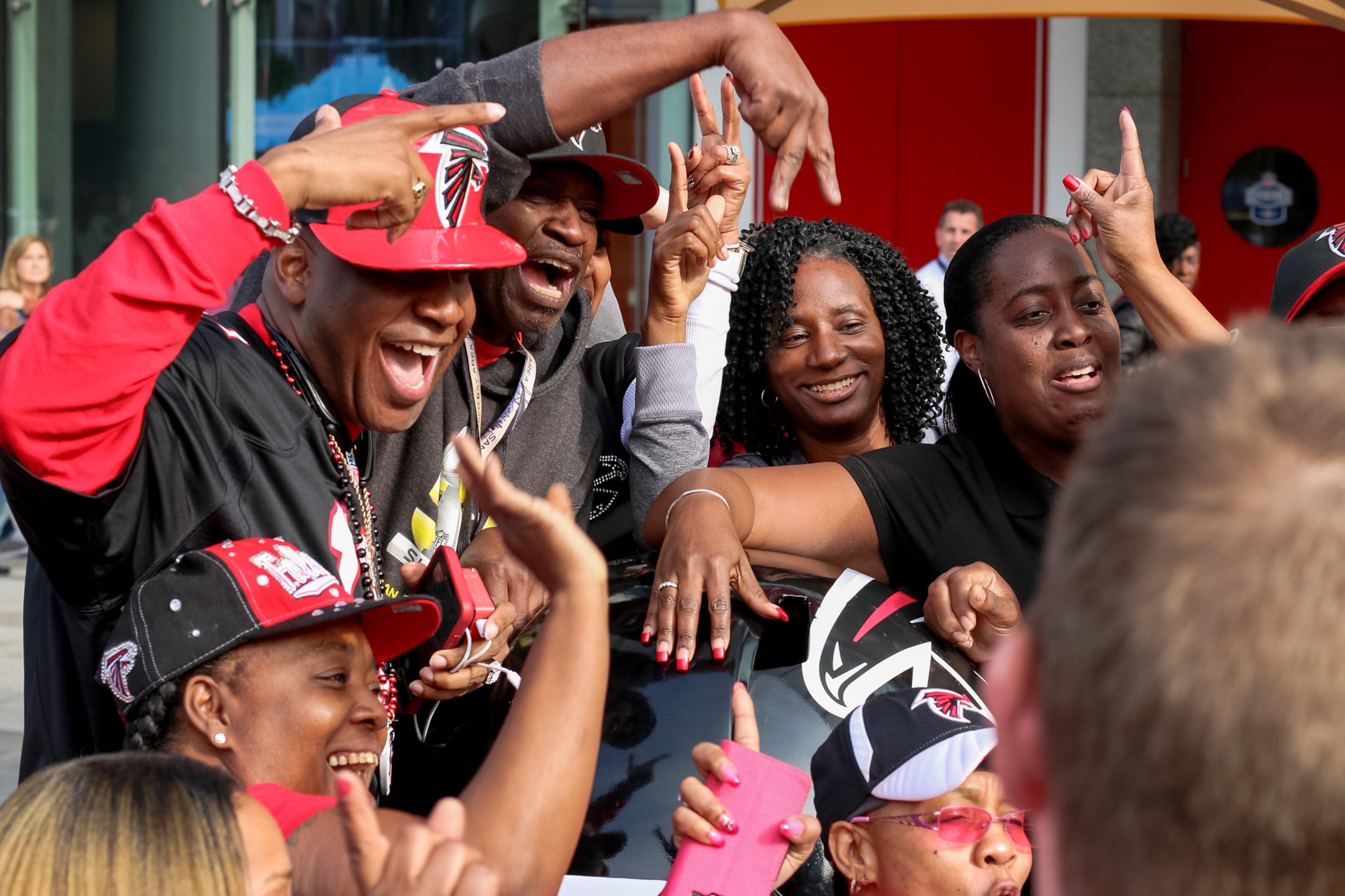Atlanta Falcons fans have descended upon Houston to celebrate and cheer on the Falcons who will face off against the New England Patriots at Super Bowl 51 on Sunday, February 5. (Janay Kingsberry/AJC)