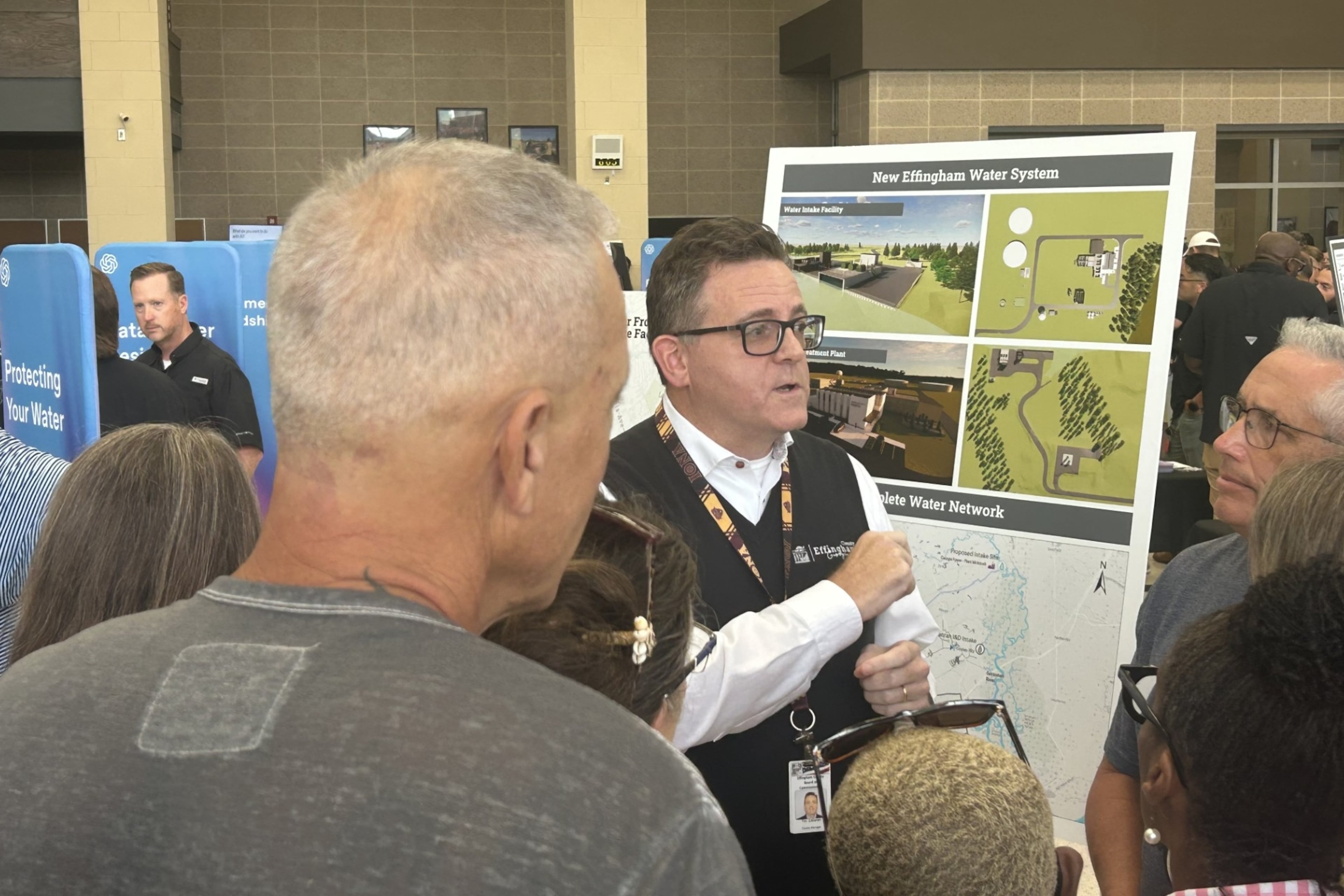 Effingham County administrator Tim Callanan speaks to concerned residents at Thursday's OpenAI data center open house. The project was announced less than 36 hours before the meeting. (Adam Van Brimmer/AJC)
