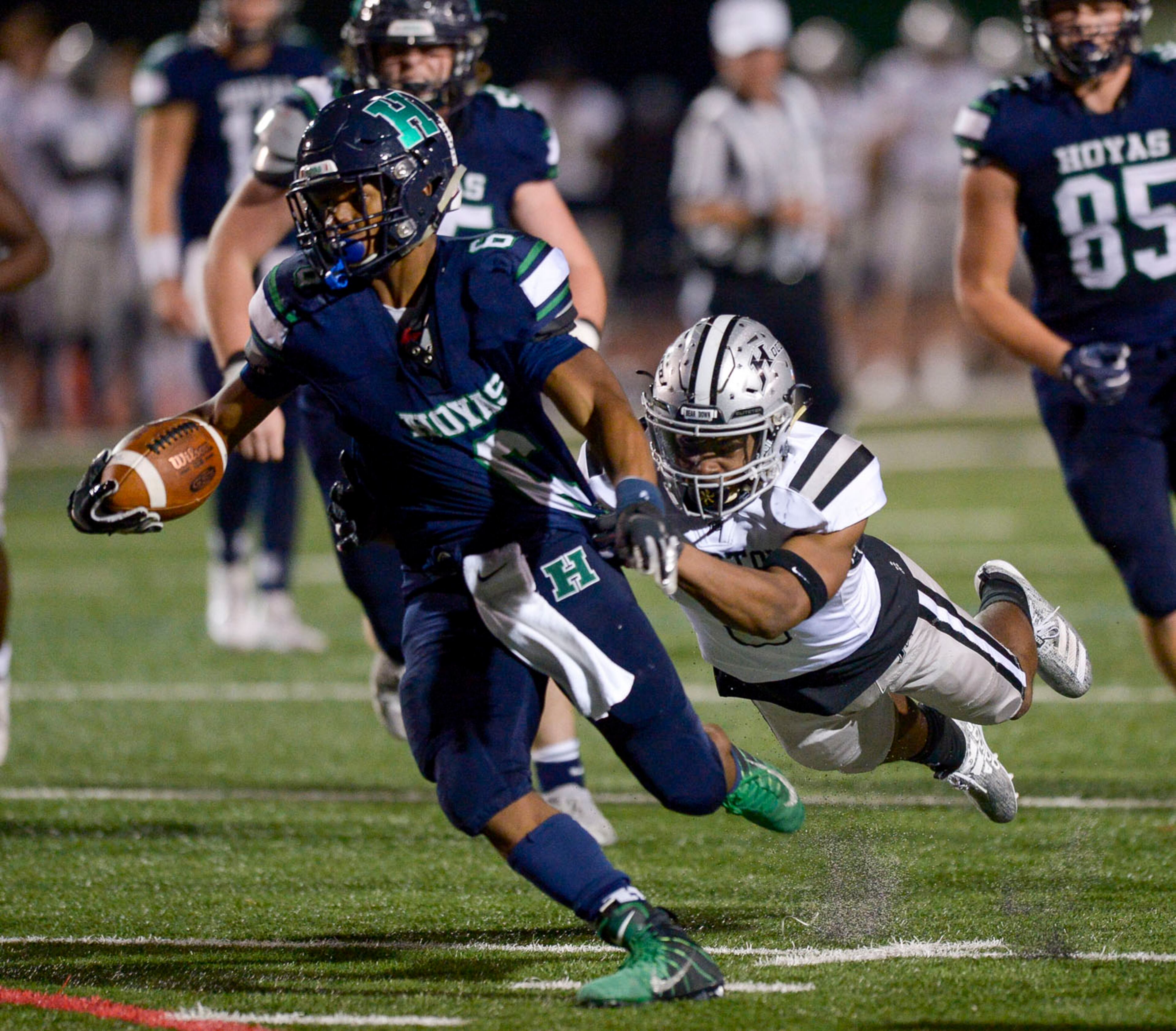 Houston County linebacker Cam Stewart (3) holds onto Harrison running back David Roberts (6) in the second half game at Harrison High School Friday, November 29, 2019. PHOTO/Daniel Varnado