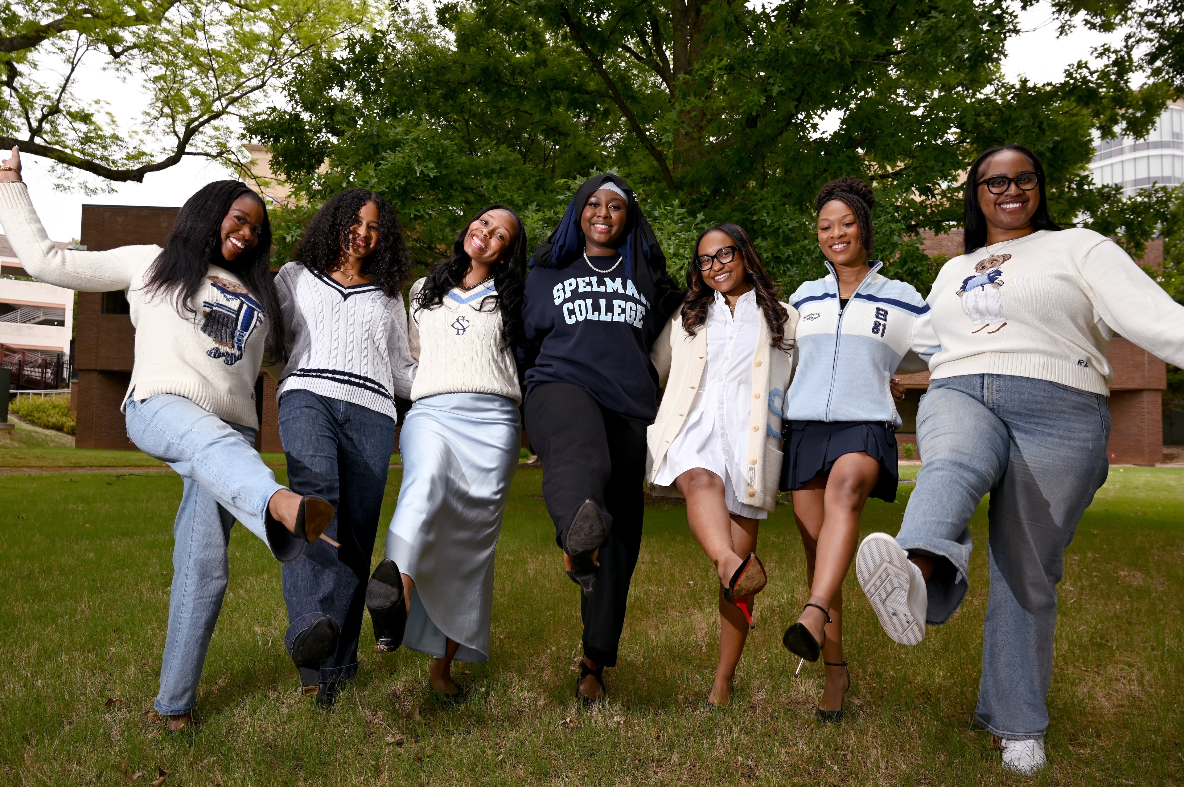 Alyssa Richardson (from left), Sophia Davis, Alexis Sims, Mariama Diallo, Cori’Anna White, Aiyana Ringo and Nia-Sarai Perry are Spelman College’s seven valedictorians. (Hyosub Shin/AJC)