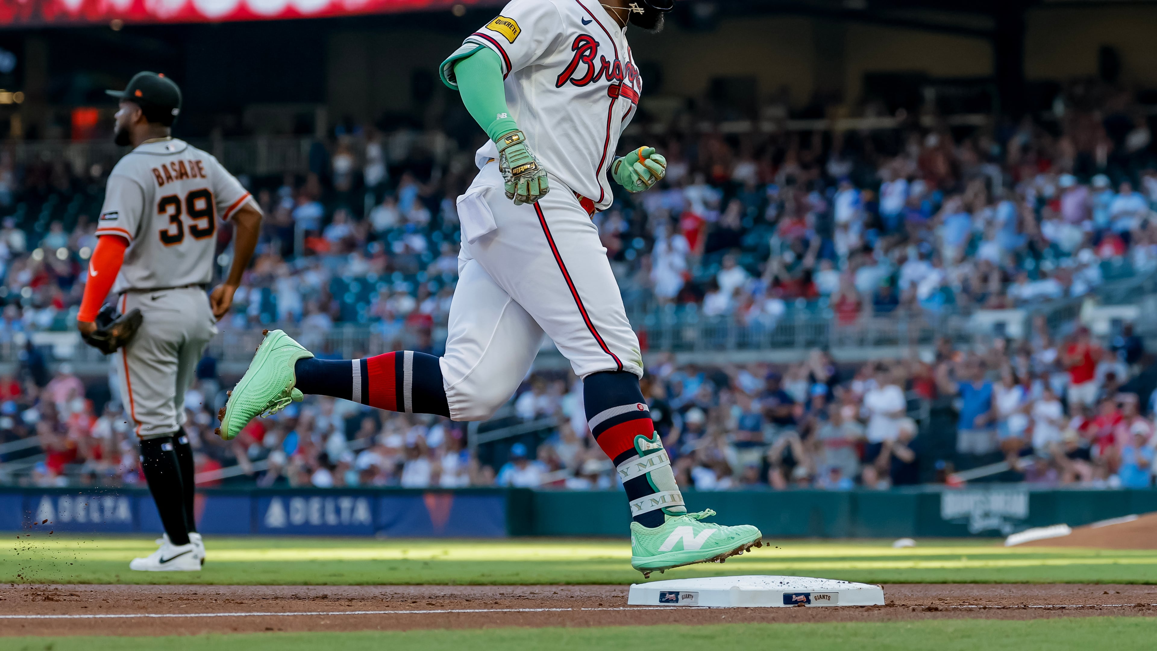 Atlanta Braves' Michael Harris II, right, rounds the bases after hitting a solo home run against the San Francisco Giants during the second inning of a baseball game, Monday, Aug. 31, 2026, in Atlanta. (AP Photo/Erik S. Lesser)