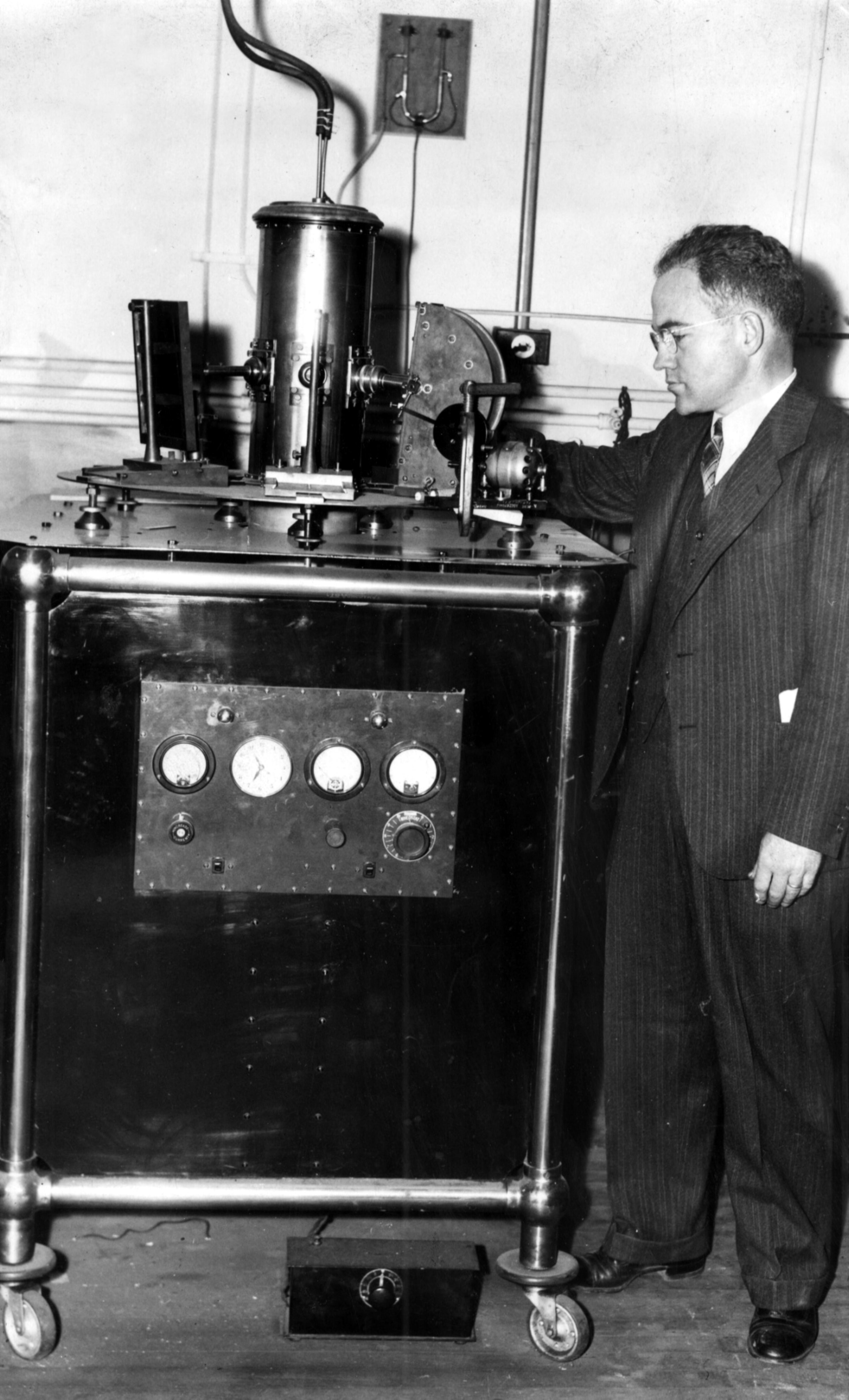 1939 -- Dr. J. H. Howey, professor of physics, is shown with an X-ray machine at Georgia Tech.