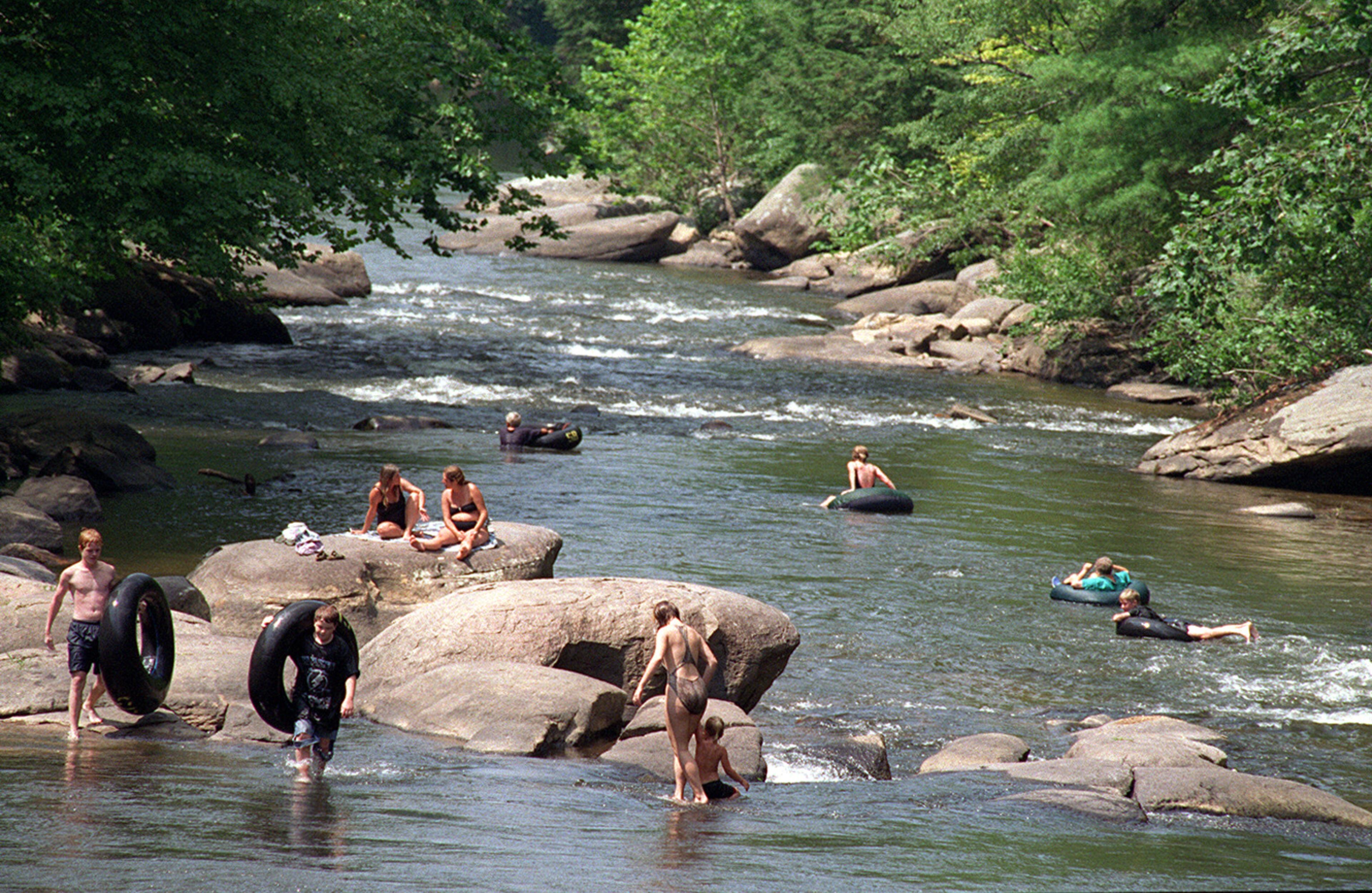 People enjoy the cool waters of the Toccoa River near Blue Ridge, Georgia. (Special to the AJC/Ben Baxter) 8/96